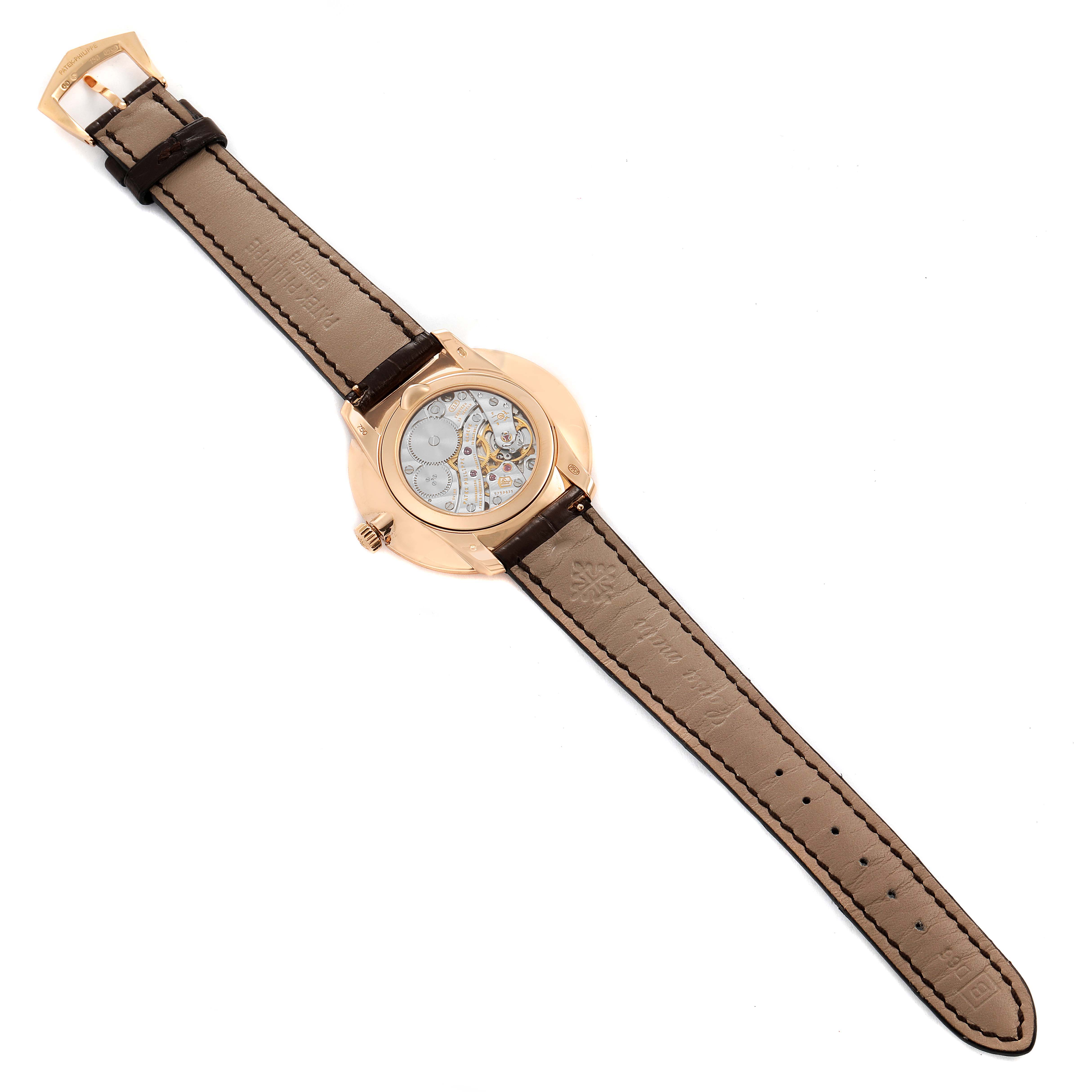 This image shows the back of a Patek Philippe Calatrava 5123R-001 Men's Rose Gold Silver Dial 5123R-001 Men's Rose Gold Silver Dial watch, displaying the movement and inner mechanics.