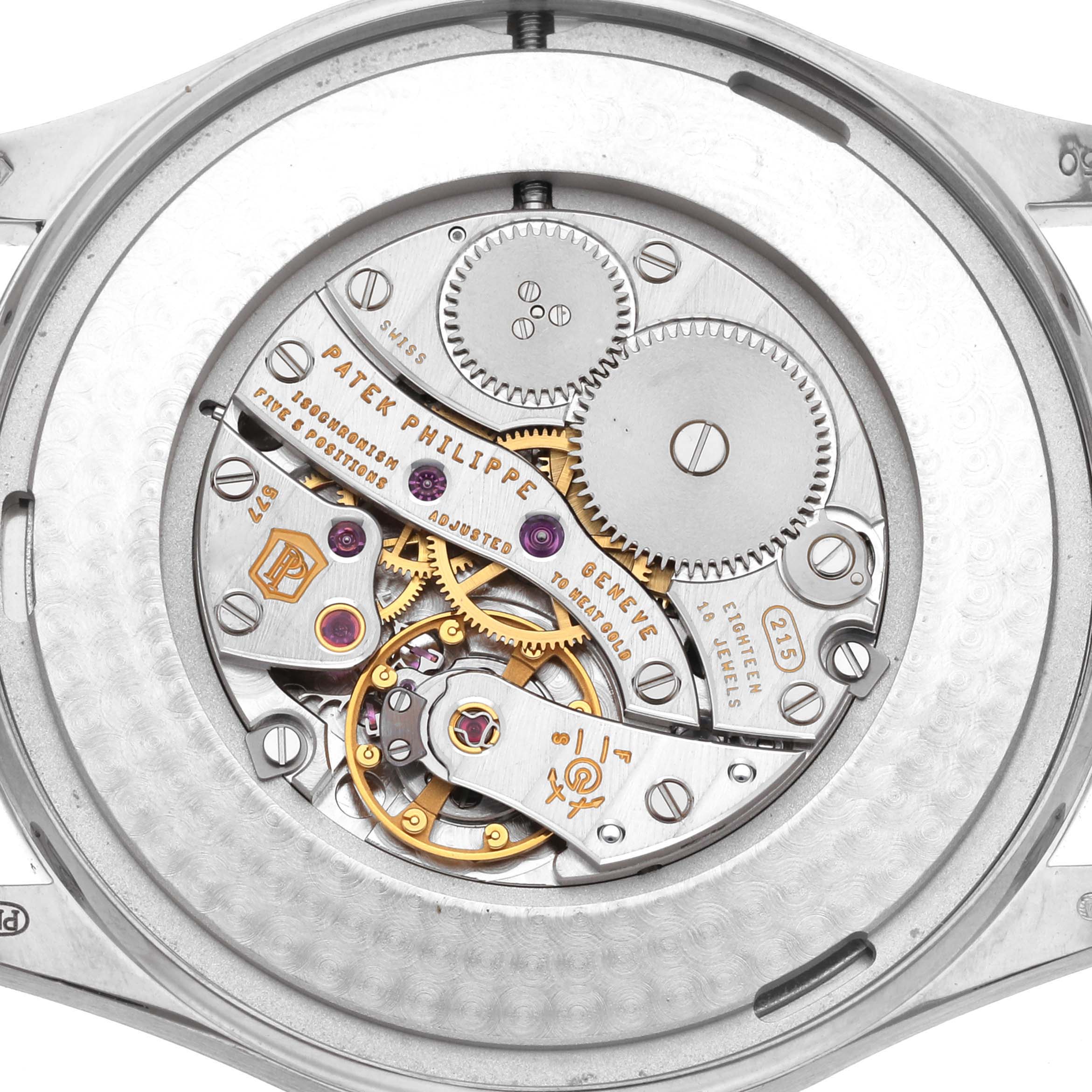 This image shows the intricate movement mechanism of a Patek Philippe Calatrava 5196G Men
s White Gold Silver Dial 5196G Men
s White Gold Silver Dial watch viewed from the back.