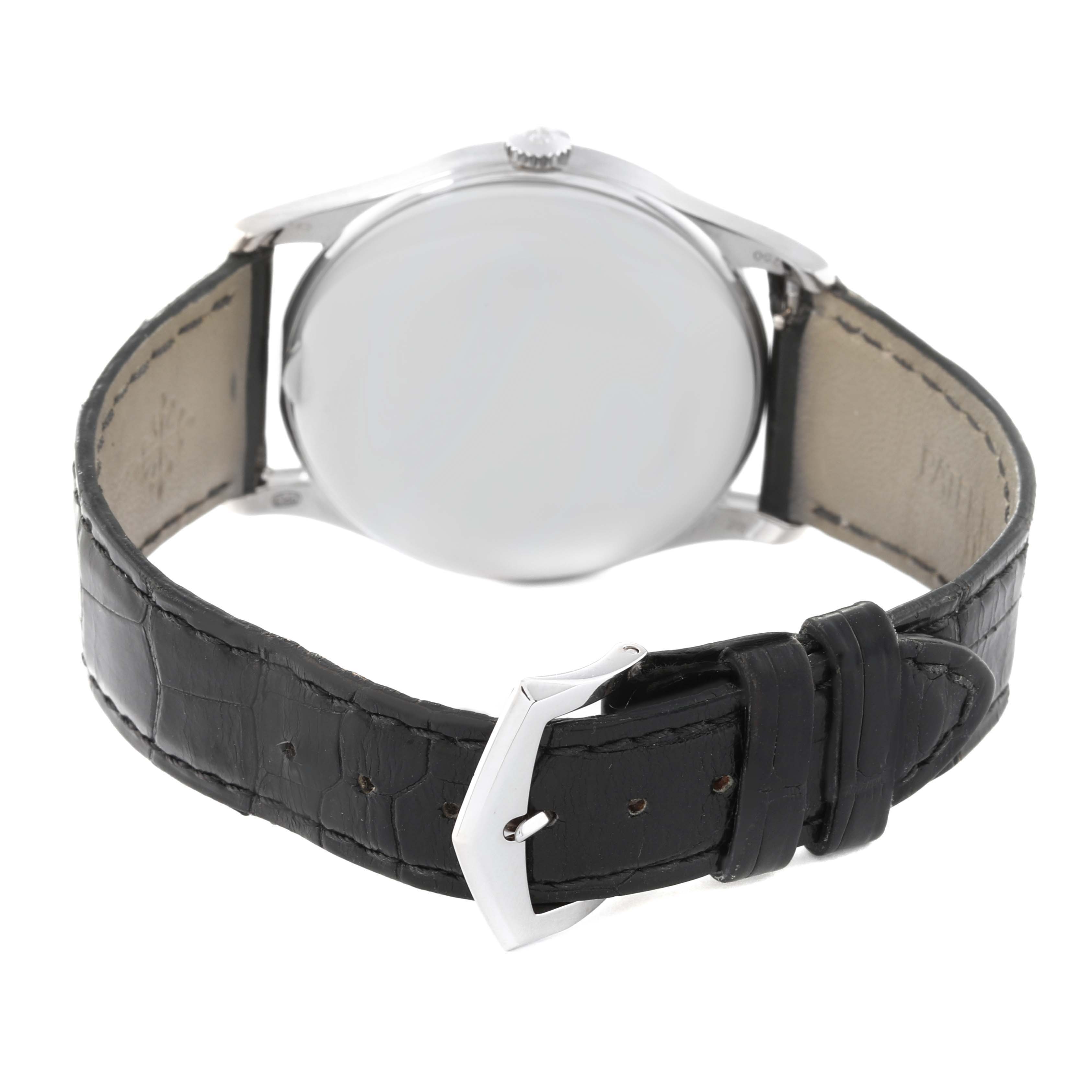 Rear view of the Patek Philippe Calatrava 5196G Men
s White Gold Silver Dial 5196G Men
s White Gold Silver Dial watch, showing the black leather strap and buckle.