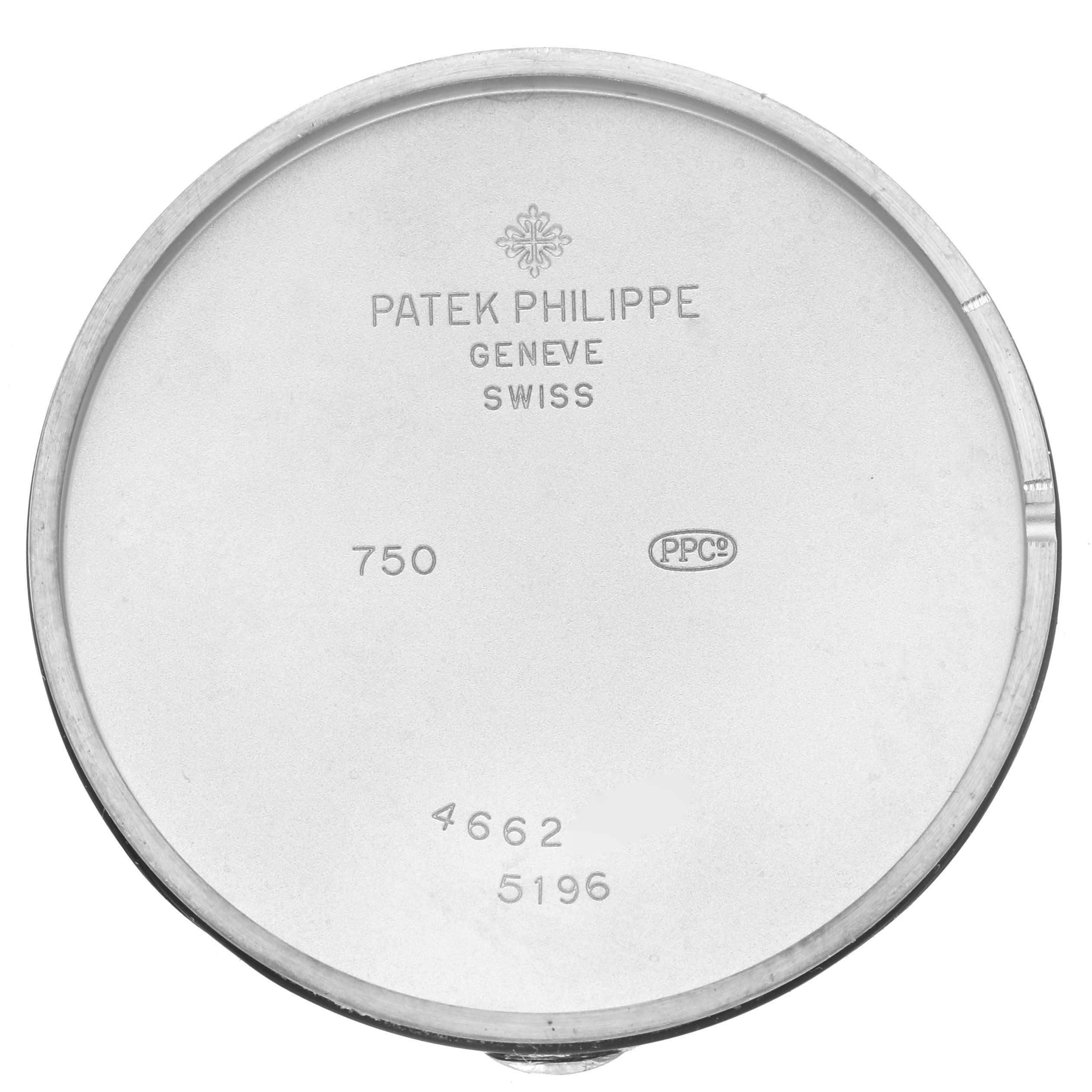 The image shows the inner case back of a Patek Philippe Calatrava 5196G Men
s White Gold Silver Dial 5196G Men
s White Gold Silver Dial watch, displaying the brand logo and inscriptions.