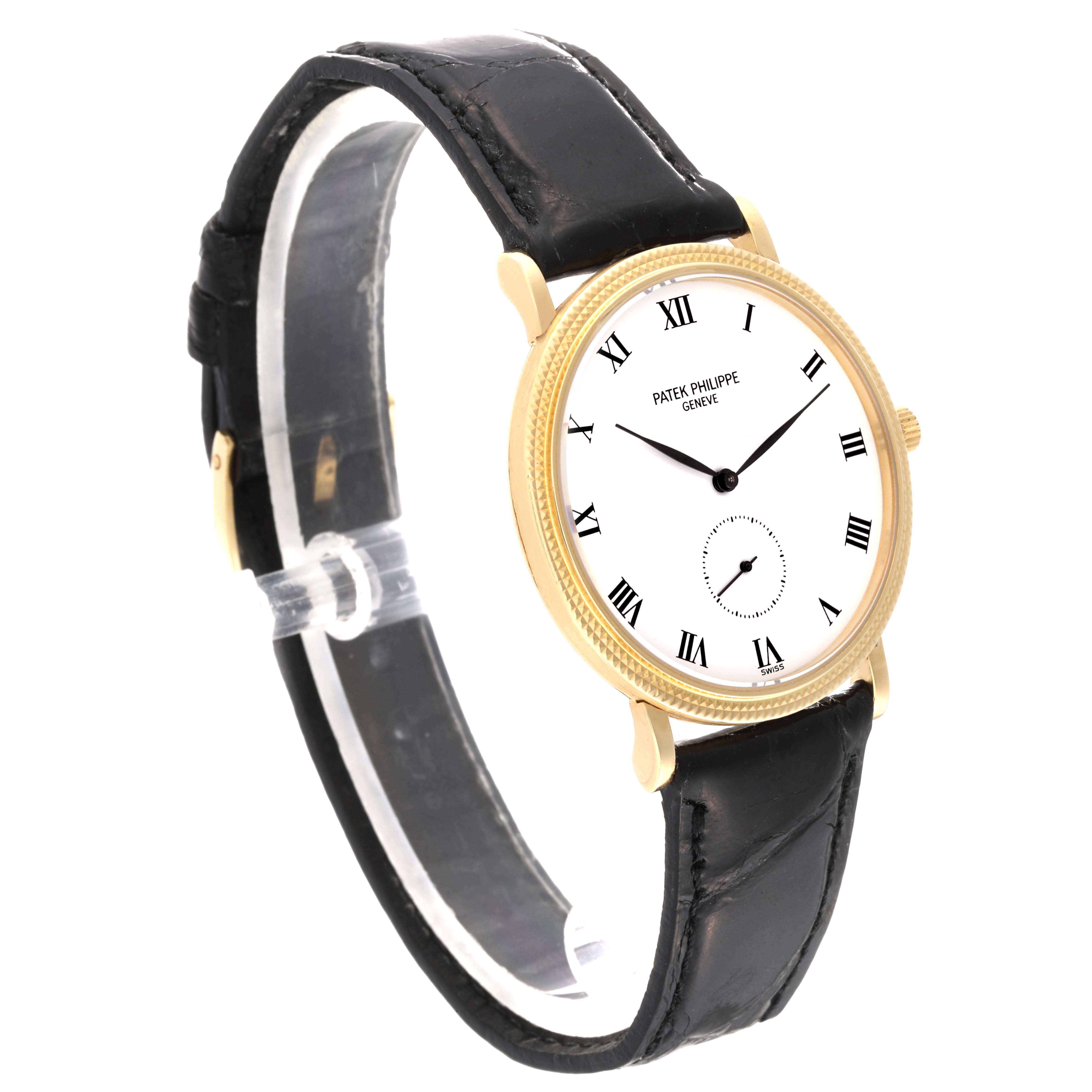 The Patek Philippe Calatrava 3919J Men's Yellow Gold White Dial 3919J Men's Yellow Gold White Dial watch is shown at a three-quarter angle, displaying its face, black leather strap, and gold case.