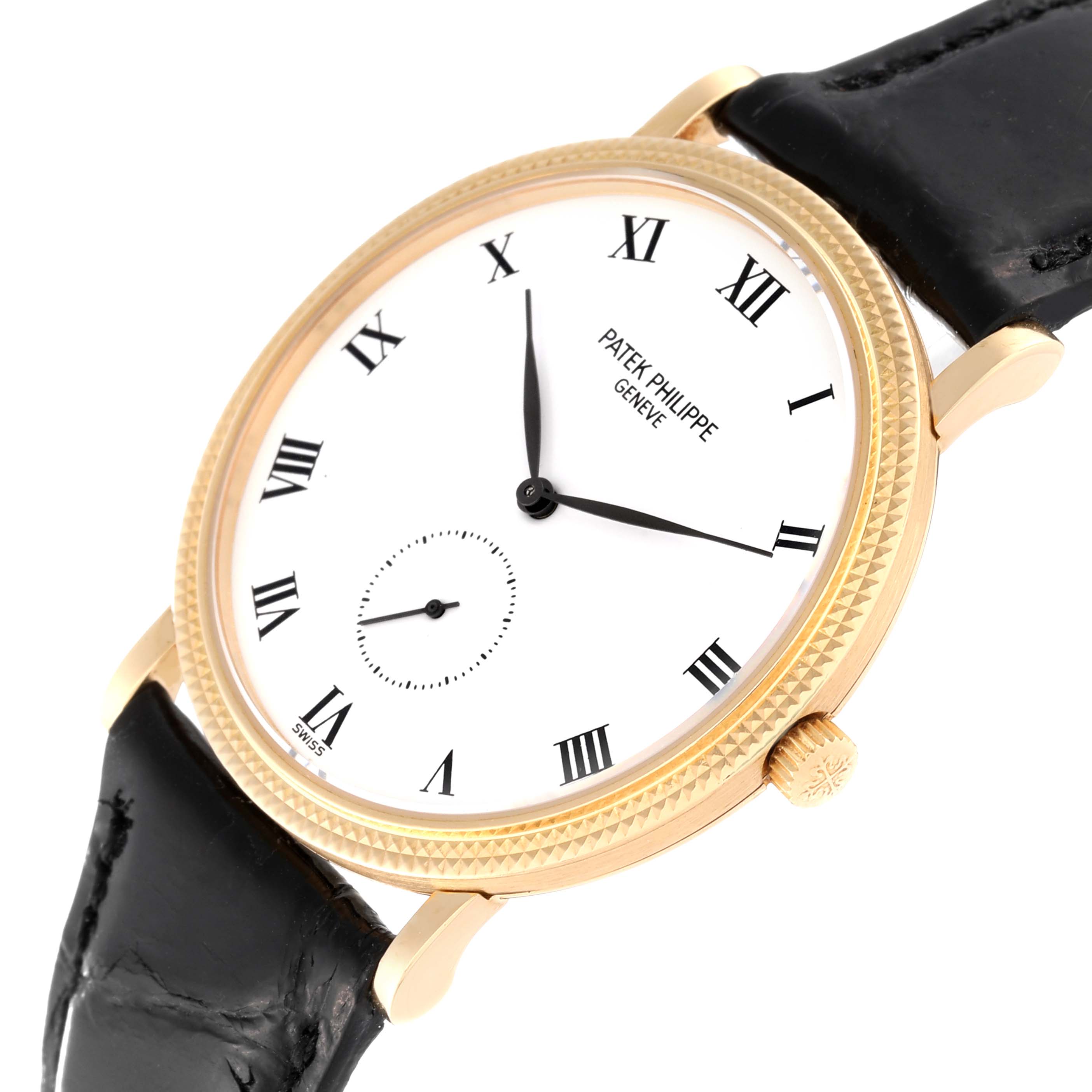 The image shows a close-up view of the Patek Philippe Calatrava 3919J Men's Yellow Gold White Dial 3919J Men's Yellow Gold White Dial watch, featuring its dial, crown, and part of the strap.