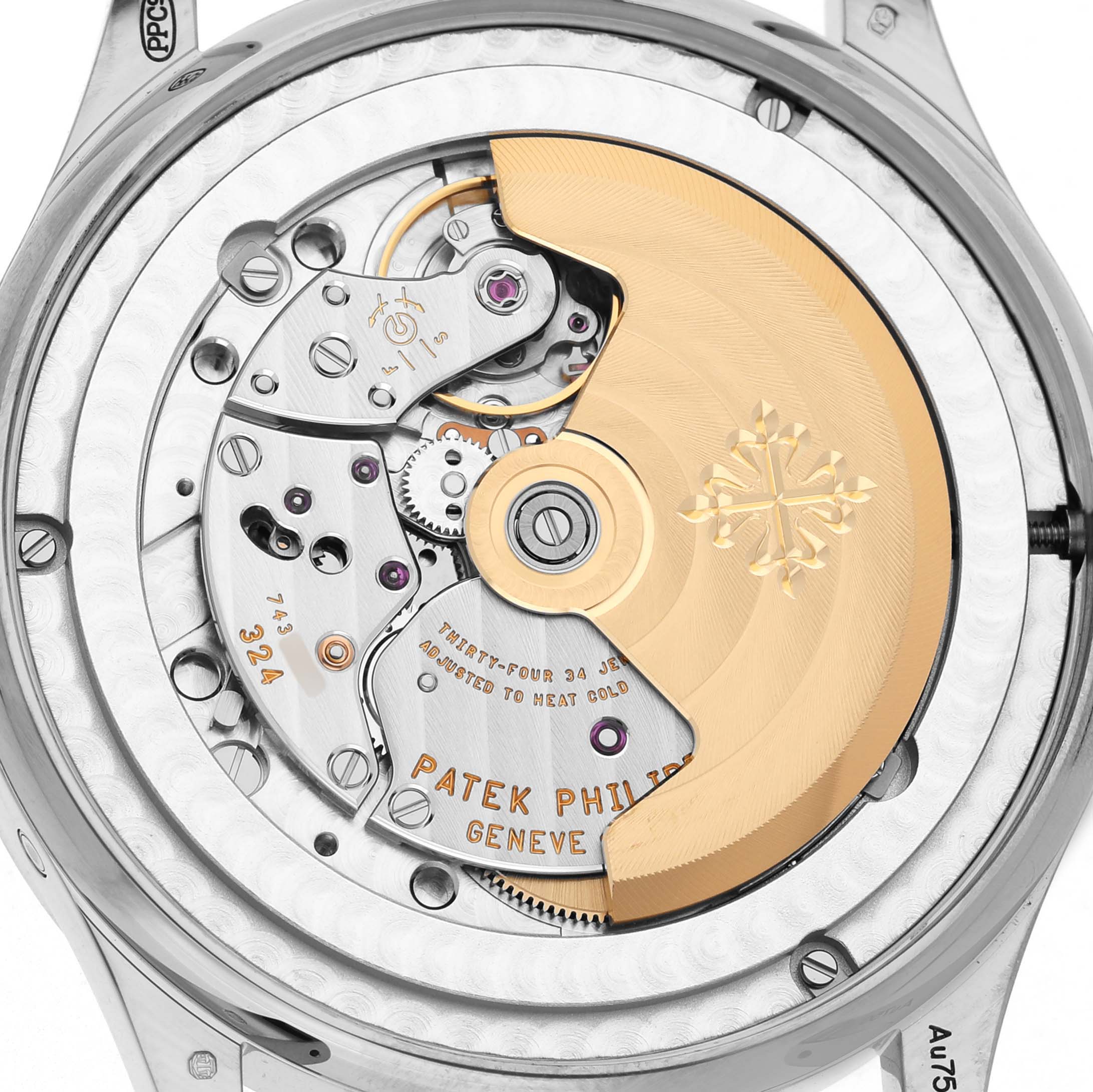The image shows the back view of a Patek Philippe Complications 5396G Men's White Gold Silver Dial model, highlighting its mechanical movement and rotor.