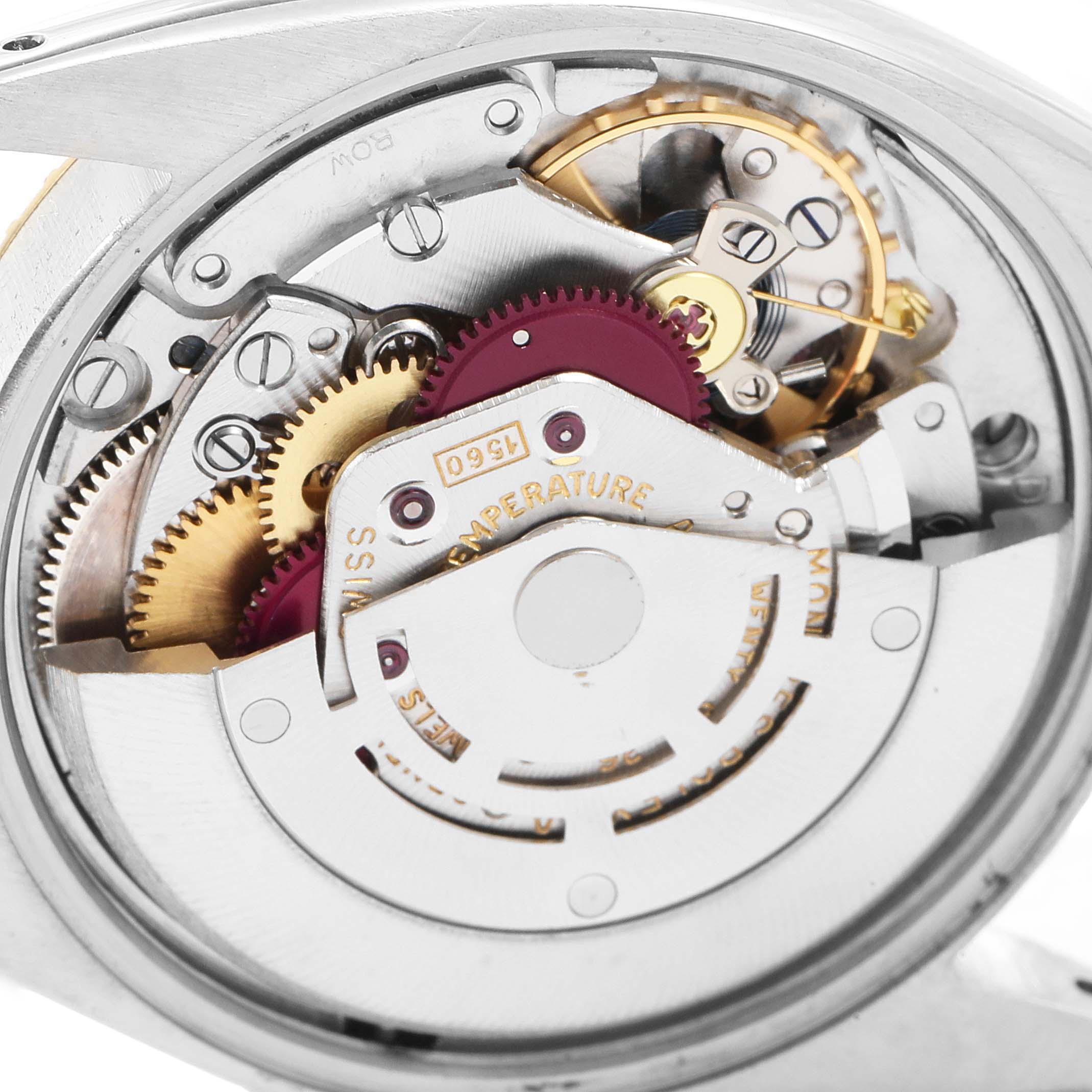 The image shows the internal mechanism of the Vintage Collection model by Rolex, highlighting the gears and movement components.