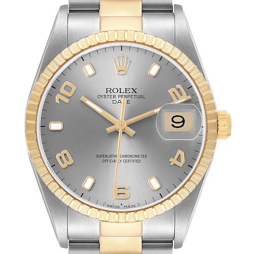 The Rolex Date 15223 Men's Steel and Gold (two tone) Silver Dial watch is shown from a front angle, highlighting the dial, bezel, and crown.