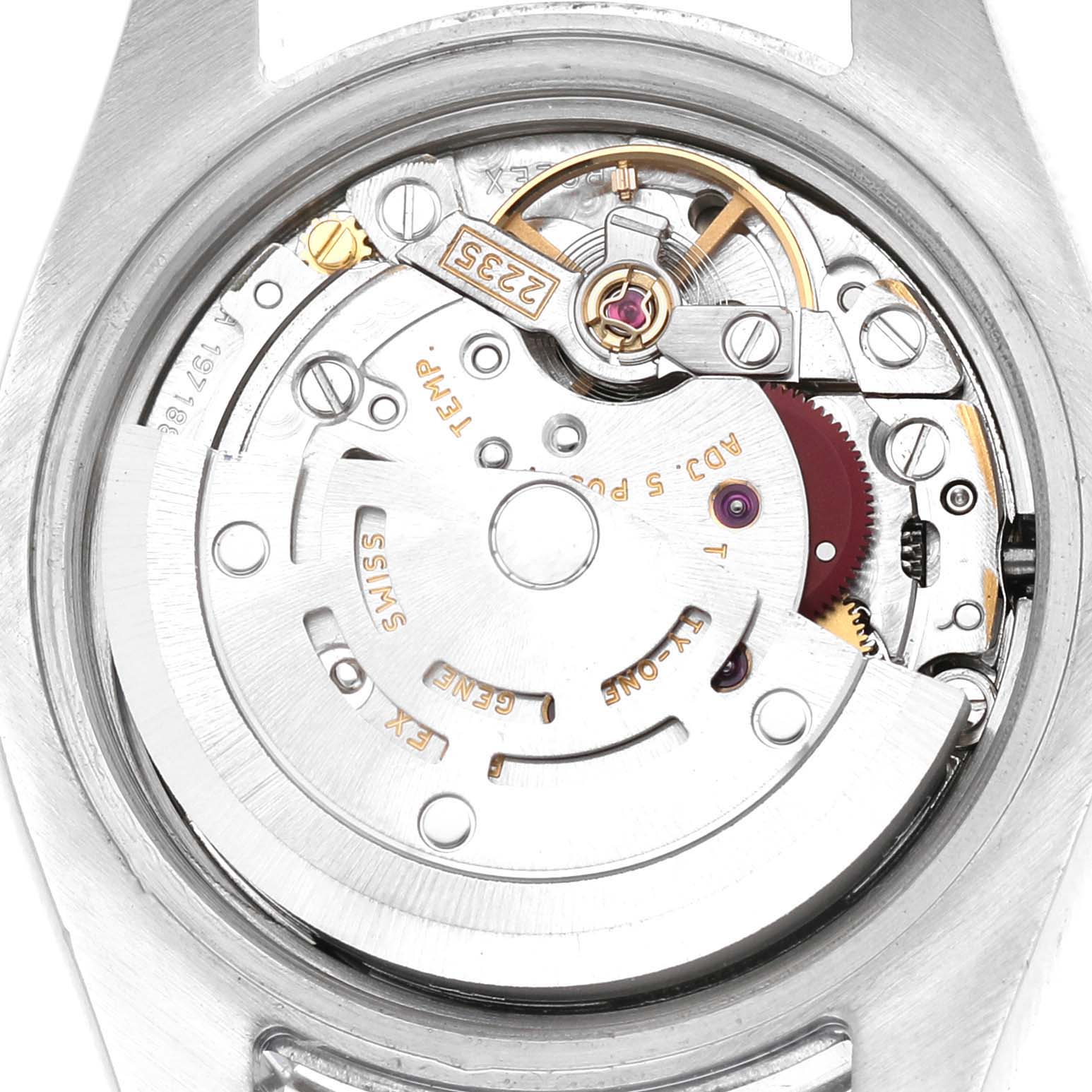 The image shows the back view of a Rolex Datejust 179160 Women's Stainless Steel Black Dial, revealing its movement and internal mechanics.