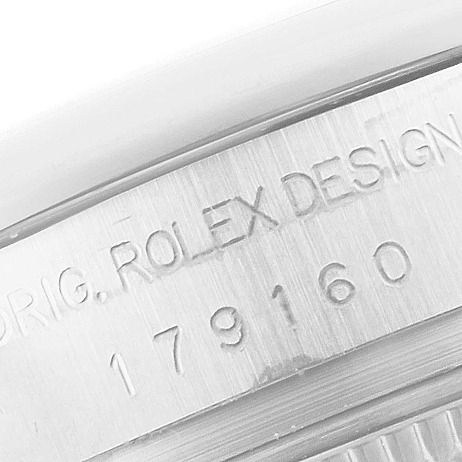 The image shows a close-up of the side engraving on the Rolex Datejust 179160 Women's Stainless Steel Black Dial watch case.