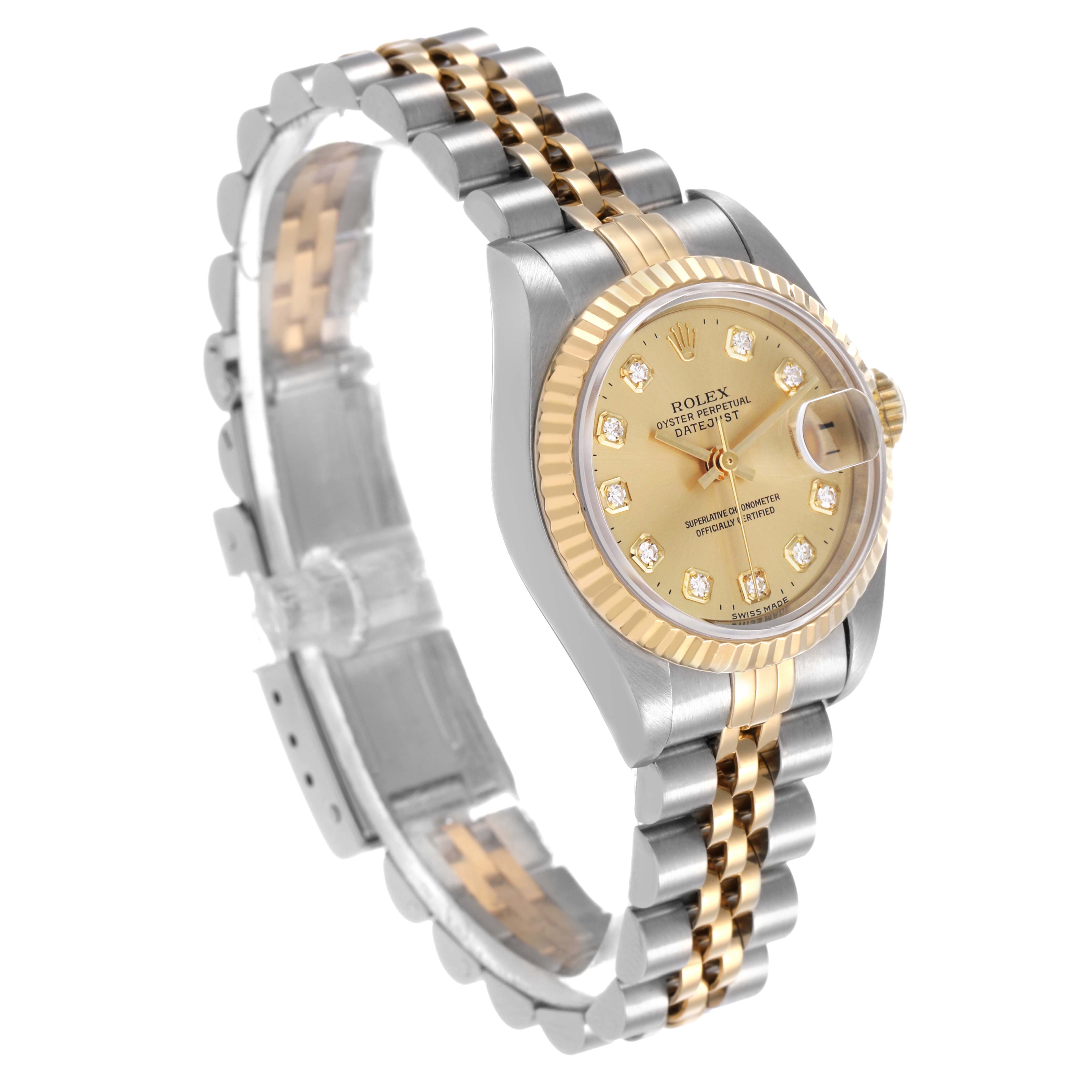 The Rolex Datejust 69173 Women's Stainless Steel Champagne Dial watch is shown at an angle highlighting its gold and silver fluted bezel, dial, and dual-tone bracelet.