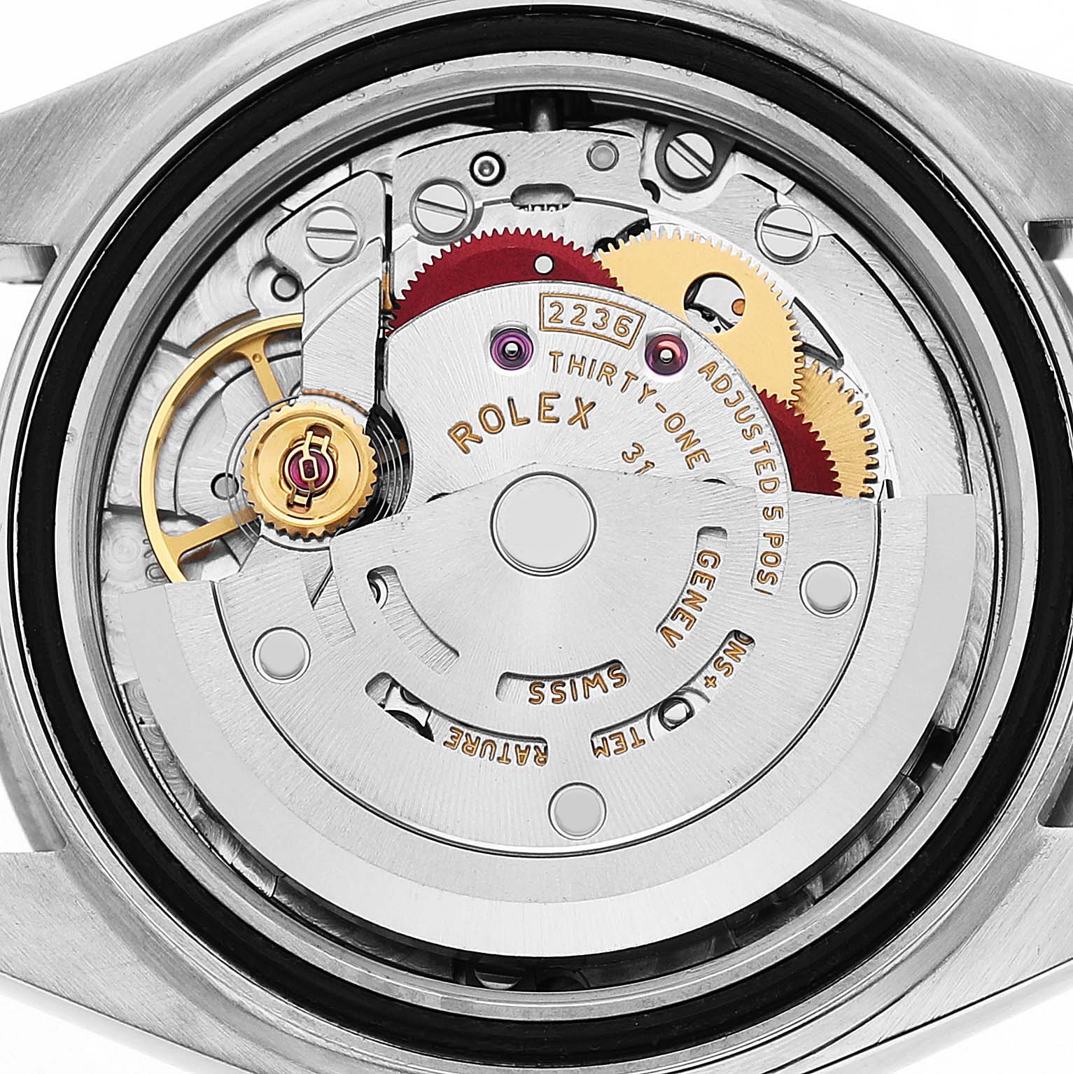 The image shows the internal movement of a Rolex Datejust 279174 Women's Stainless Steel Silver Dial, highlighting gears and components from a rear view.