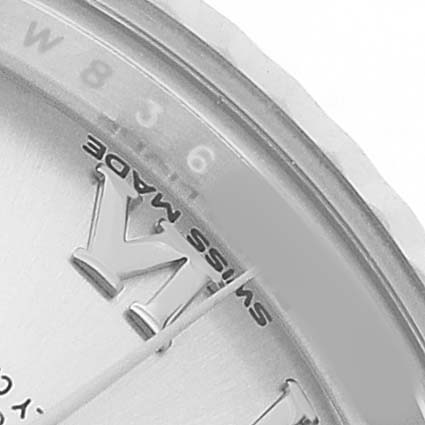 The image shows a close-up of the dial and bezel, highlighting part of the indices and markings of the Rolex Datejust 279174 Women's Stainless Steel Silver Dial watch.