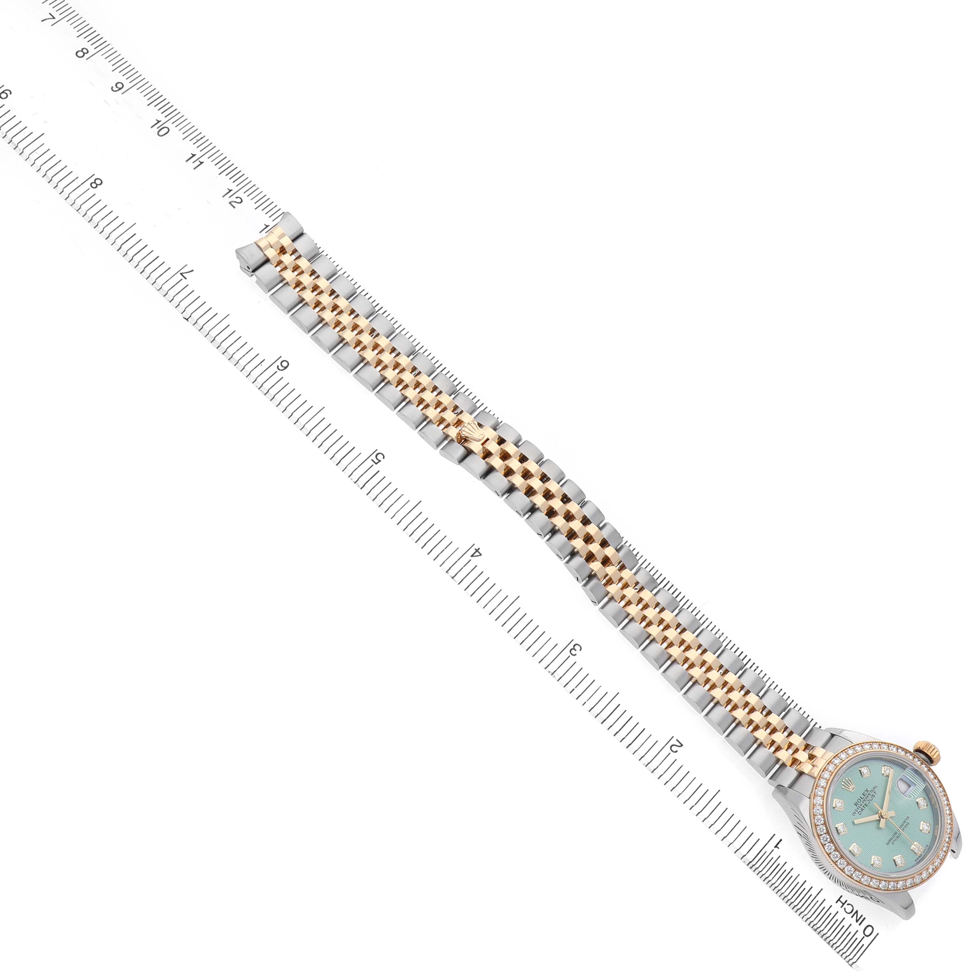 The Rolex Datejust 279383RBR Women's Steel and Gold (two tone) Green Dial watch is shown from a top angle, displaying its full two-tone bracelet and the face with a diamond bezel.
