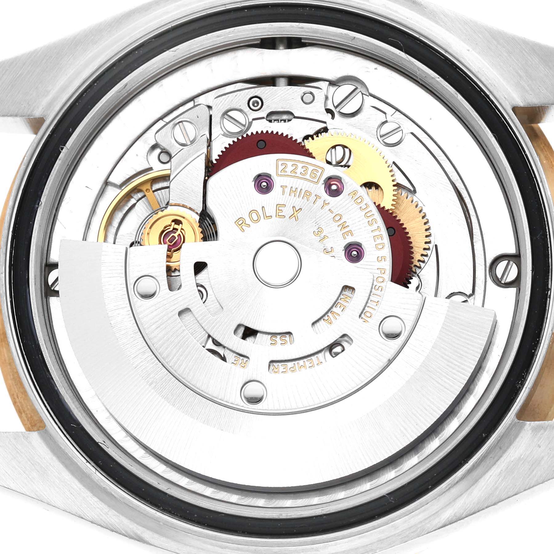 The image shows a close-up of the movement inside a Rolex Datejust 278383 Women's Steel and Gold (two tone) Green Dial watch.