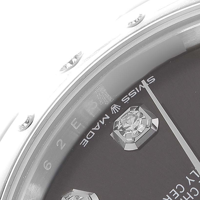The image shows a partial view of a Rolex Datejust 278344 Women
s Stainless Steel Grey Dial 278344 Women
s Stainless Steel Grey Dial watch face, highlighting the dial with diamond markers and edge of the bezel.