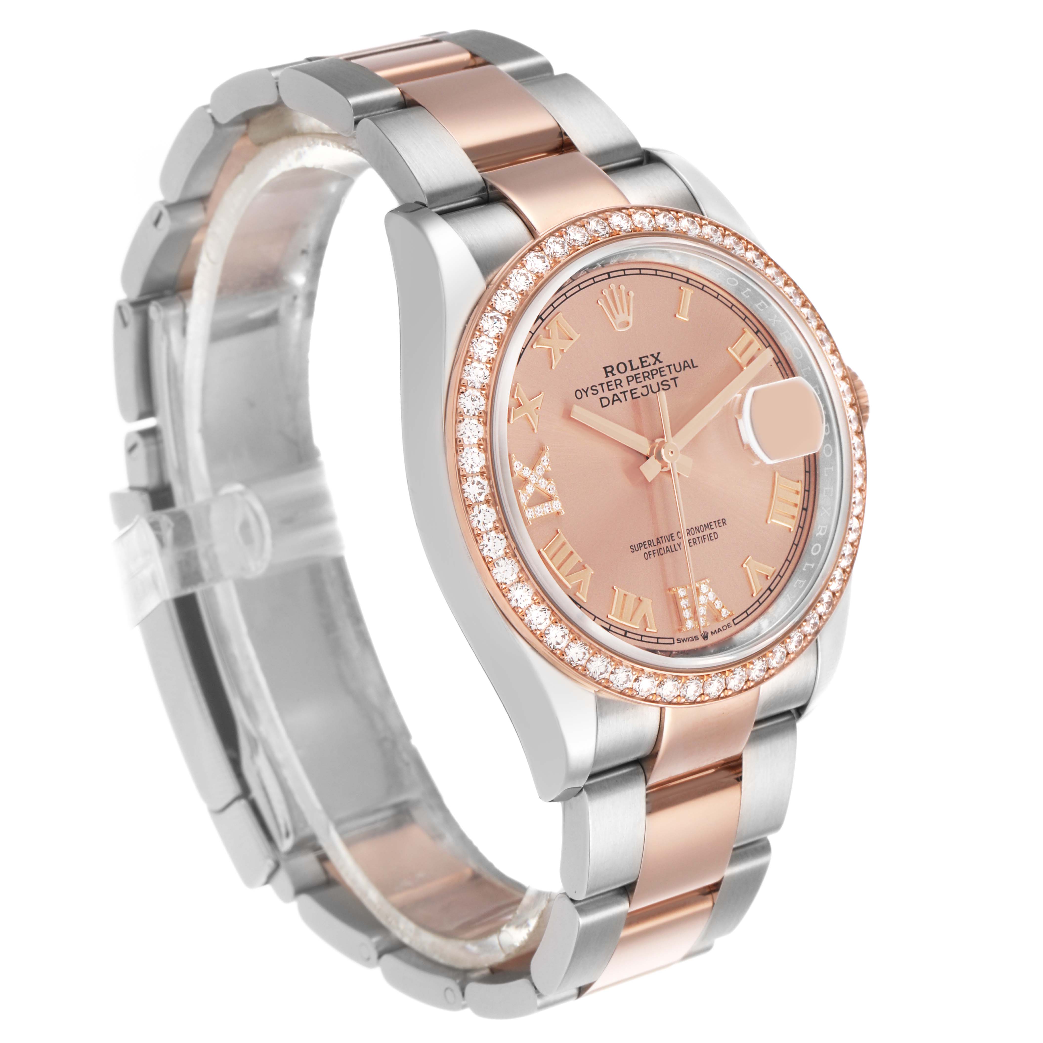 The Rolex Datejust 126281 Men's Steel and Gold (two tone) Pink Dial watch is shown at a slight angle, highlighting its rose gold and silver bracelet, diamond bezel, and face detail.