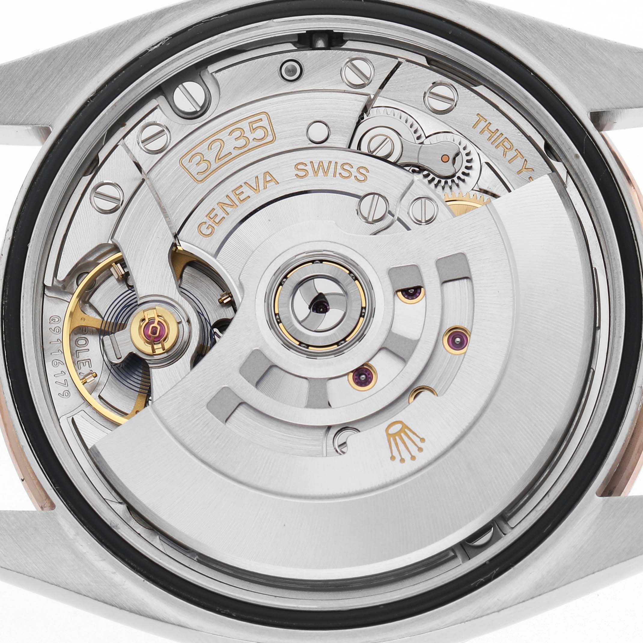 The image shows the movement of a Rolex Datejust 126281 Men's Steel and Gold (two tone) Pink Dial watch from a top-down angle.