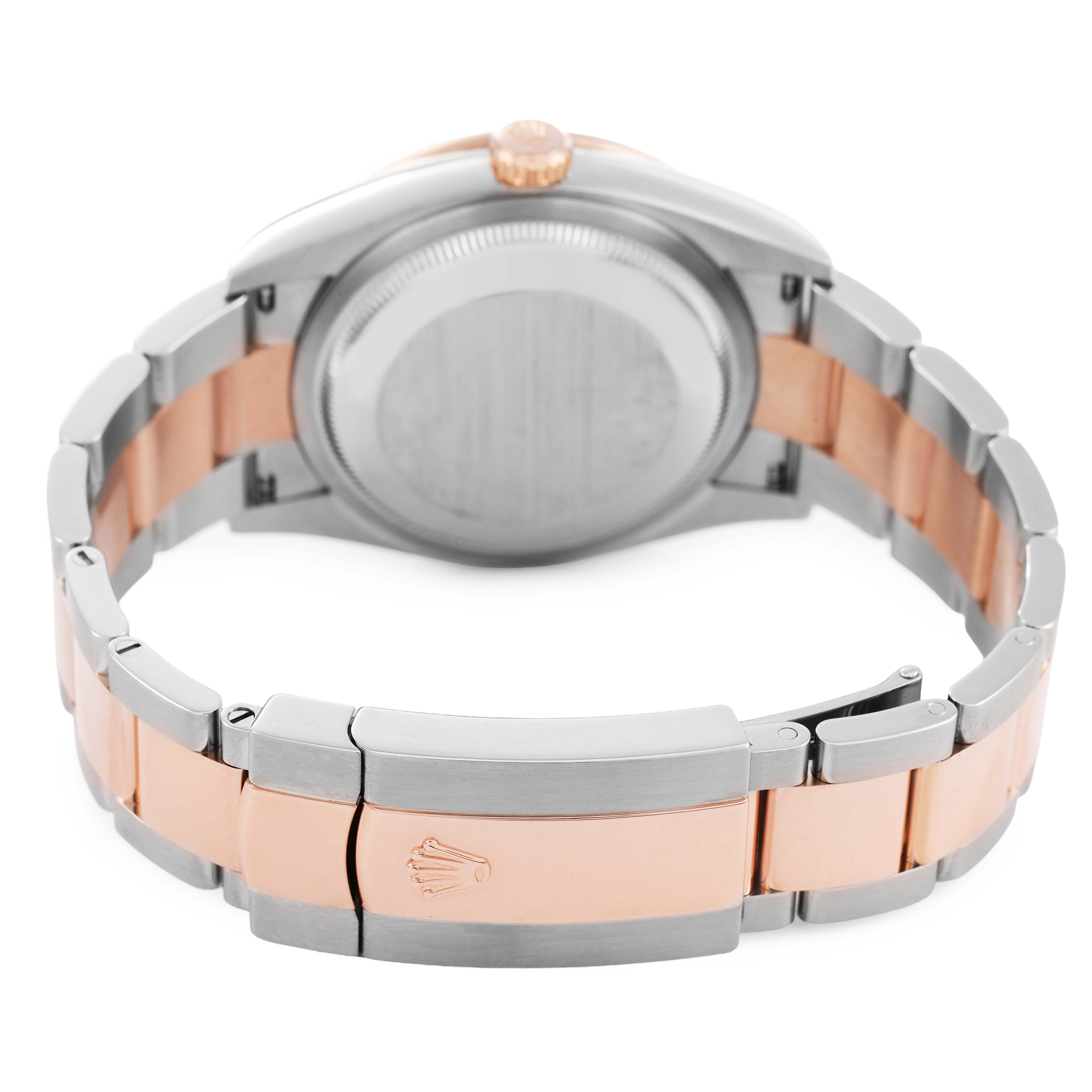 The Rolex Datejust 126281 Men's Steel and Gold (two tone) Pink Dial watch is shown from the rear angle, highlighting the case back and two-tone metal bracelet with the clasp.