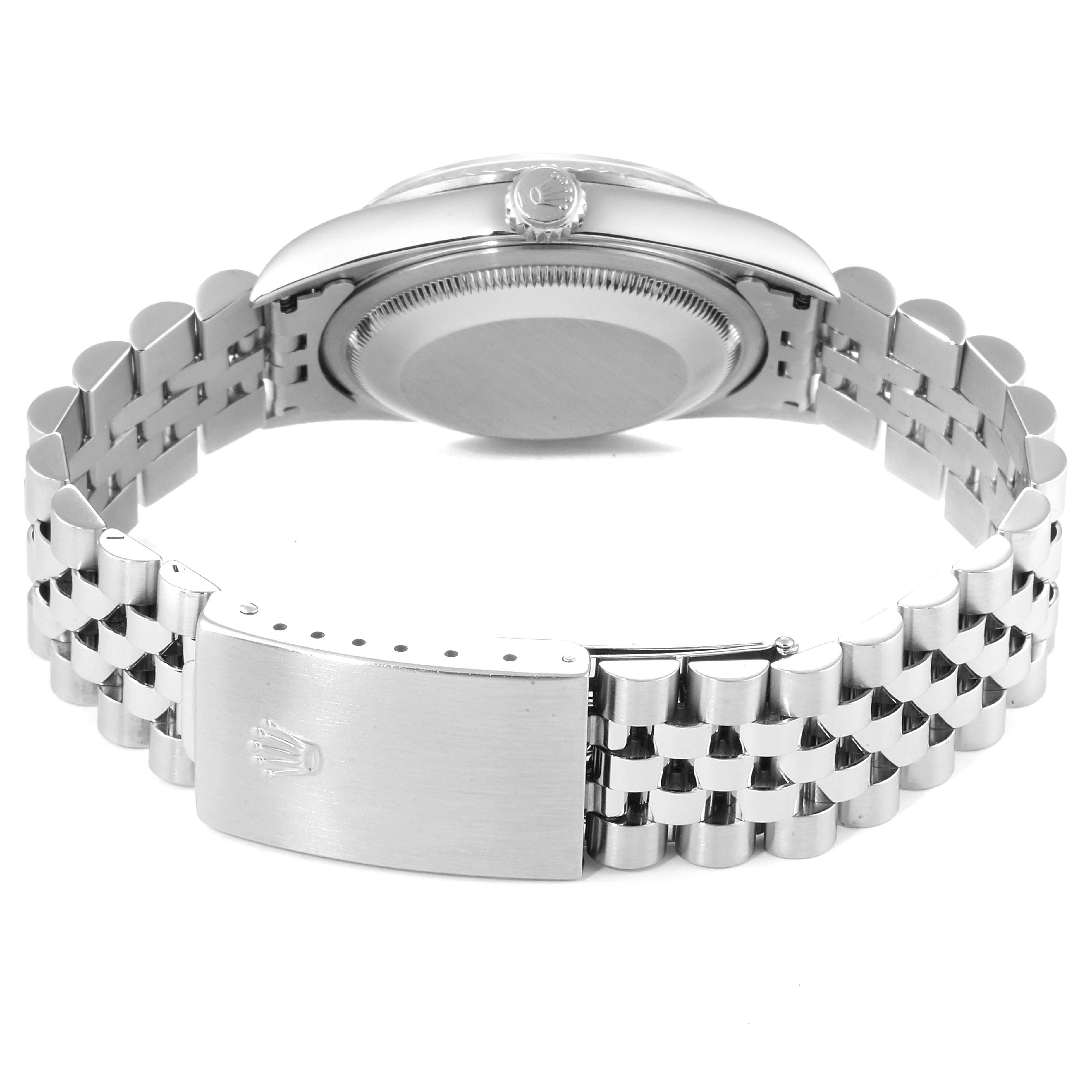 The image shows the back view of a Rolex Datejust 16234 Men's Stainless Steel White Dial 16234 Men's Stainless Steel White Dial watch, highlighting the case back and the Jubilee bracelet with a clasp.