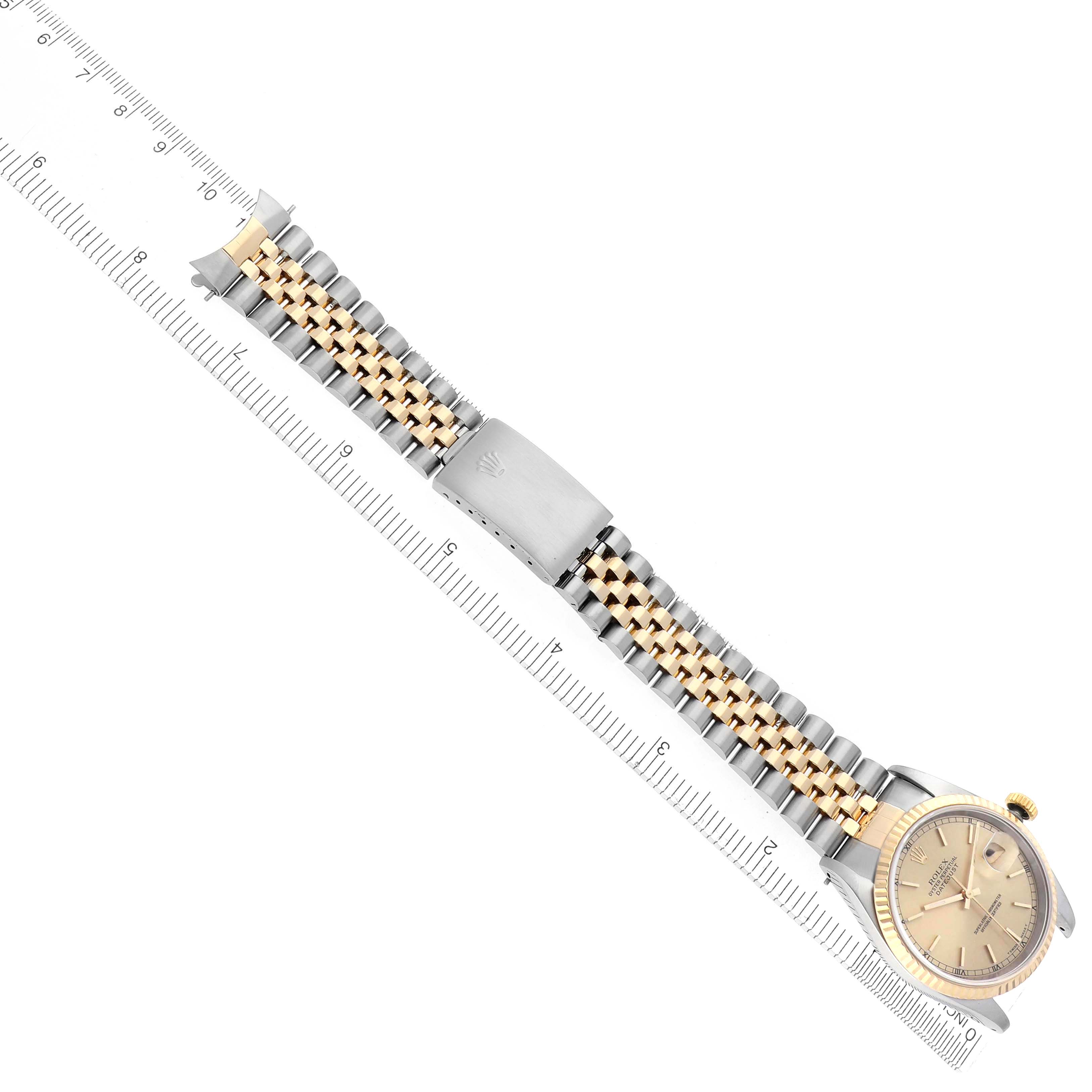 The image shows a Rolex Datejust 16233 Men
s Steel and Gold (two tone) Champagne Dial 16233 Men
s Steel and Gold (two tone) Champagne Dial watch from a top-down angle, highlighting the face, bezel, and jubilee bracelet.