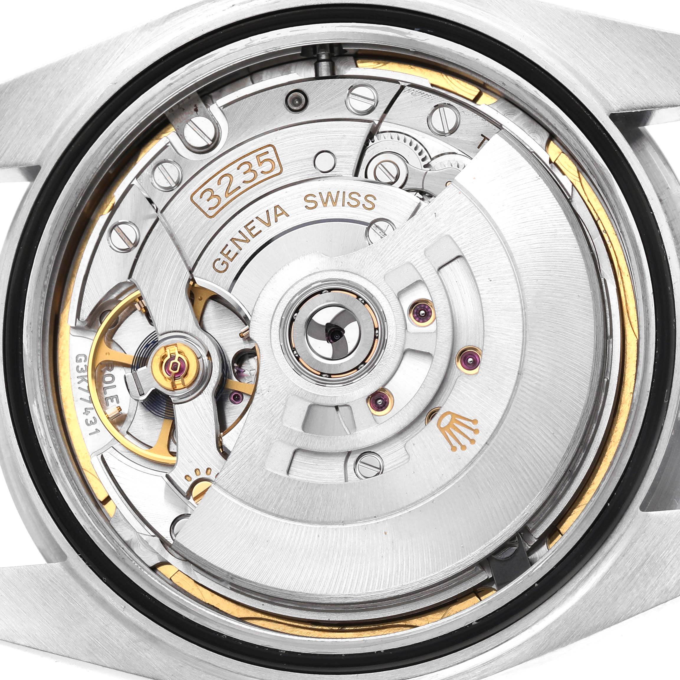 The image shows the movement of a Rolex Datejust 41 126300 Men's Stainless Steel Blue Dial, focusing on its intricate mechanism from a rear or open-case angle.