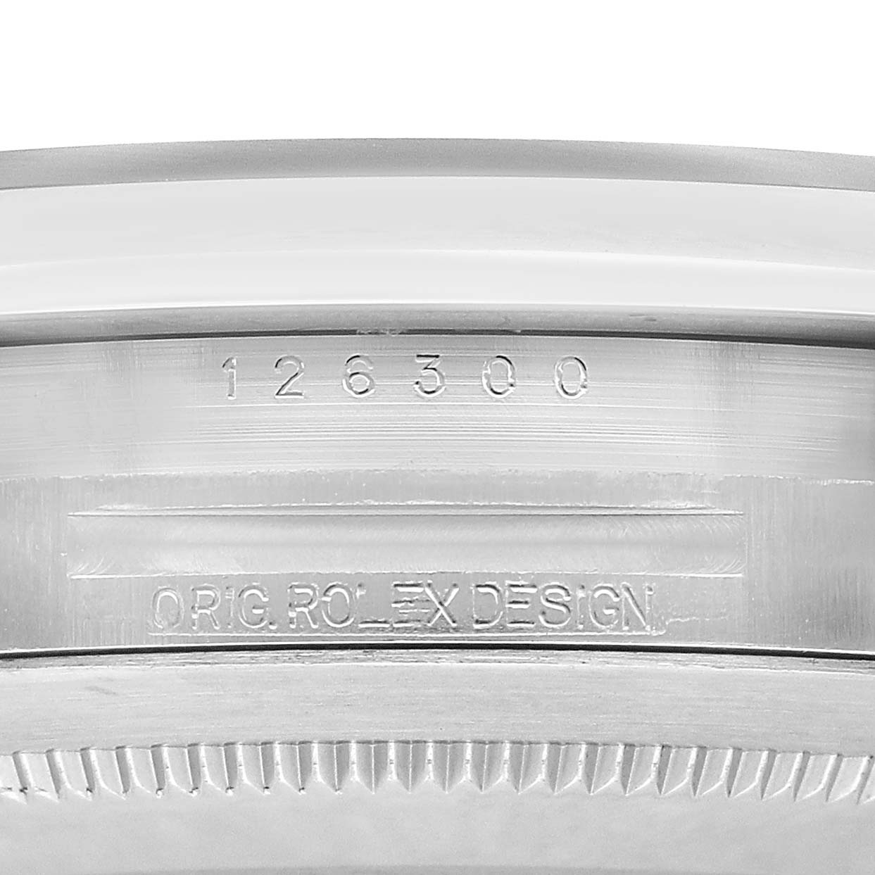 The image shows a detailed close-up of the inner case of a Rolex Datejust 41 126300 Men's Stainless Steel Blue Dial, featuring engraved reference numbers.
