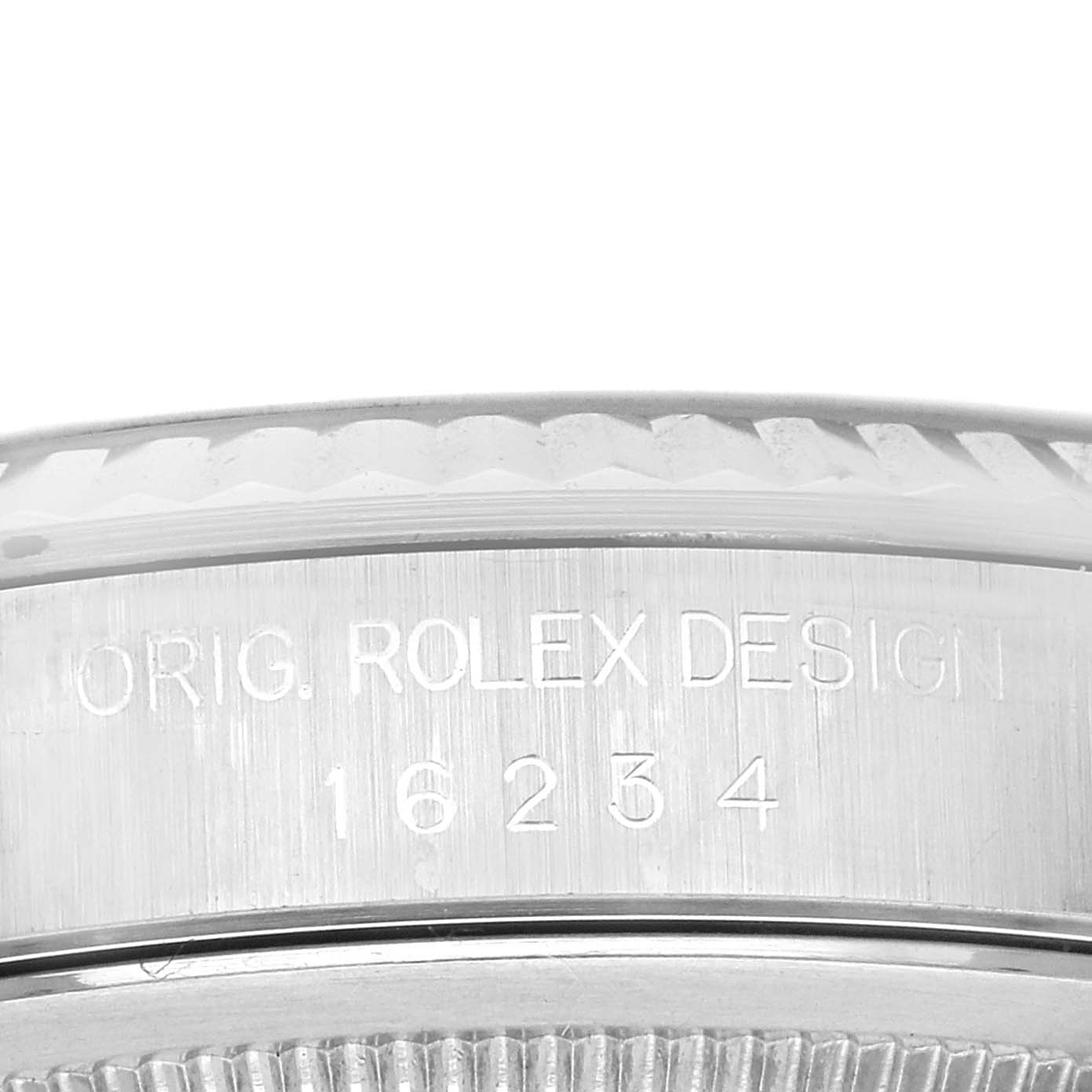 This is a close-up image of the side of the Rolex Datejust 16234G Men's Stainless Steel Blue Dial 16234G Men's Stainless Steel Blue Dial watch case, showing the model engraving "16234."