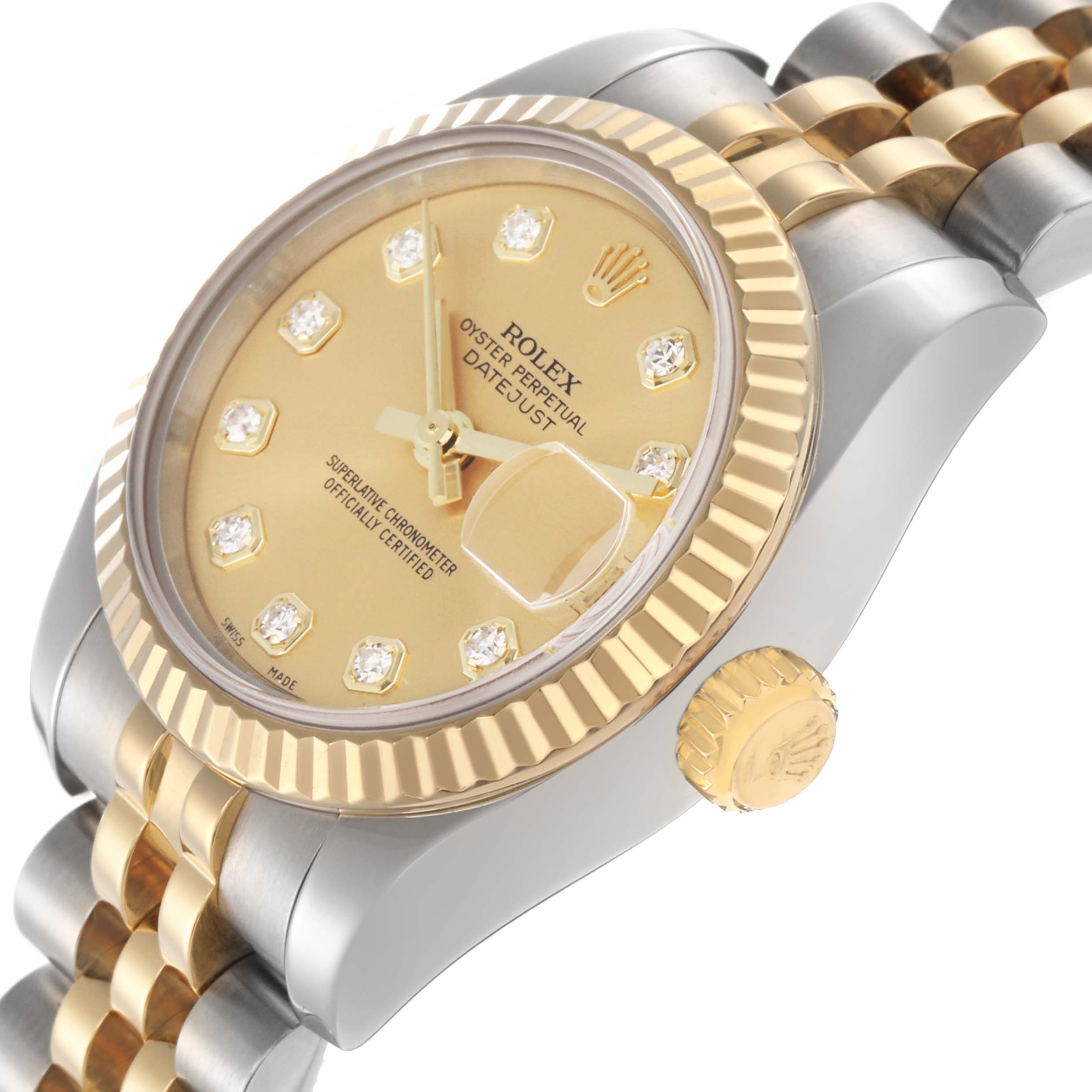 The image shows a Rolex Datejust 179173 Women
s Steel and Gold (two tone) Champagne Dial 179173 Women
s Steel and Gold (two tone) Champagne Dial watch at an oblique angle, highlighting the face, bezel, crown, and part of the bracelet.
