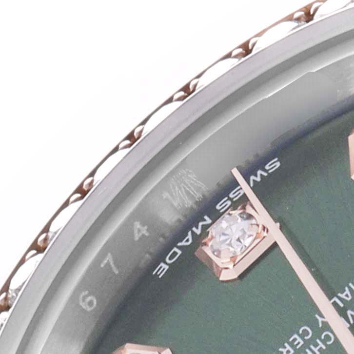 The image shows a close-up view of the Rolex Datejust 279381 Women's Steel and Gold (two tone) Green Dial 279381 Women's Steel and Gold (two tone) Green Dial watch face, highlighting diamond hour markers and the edge of the bezel.