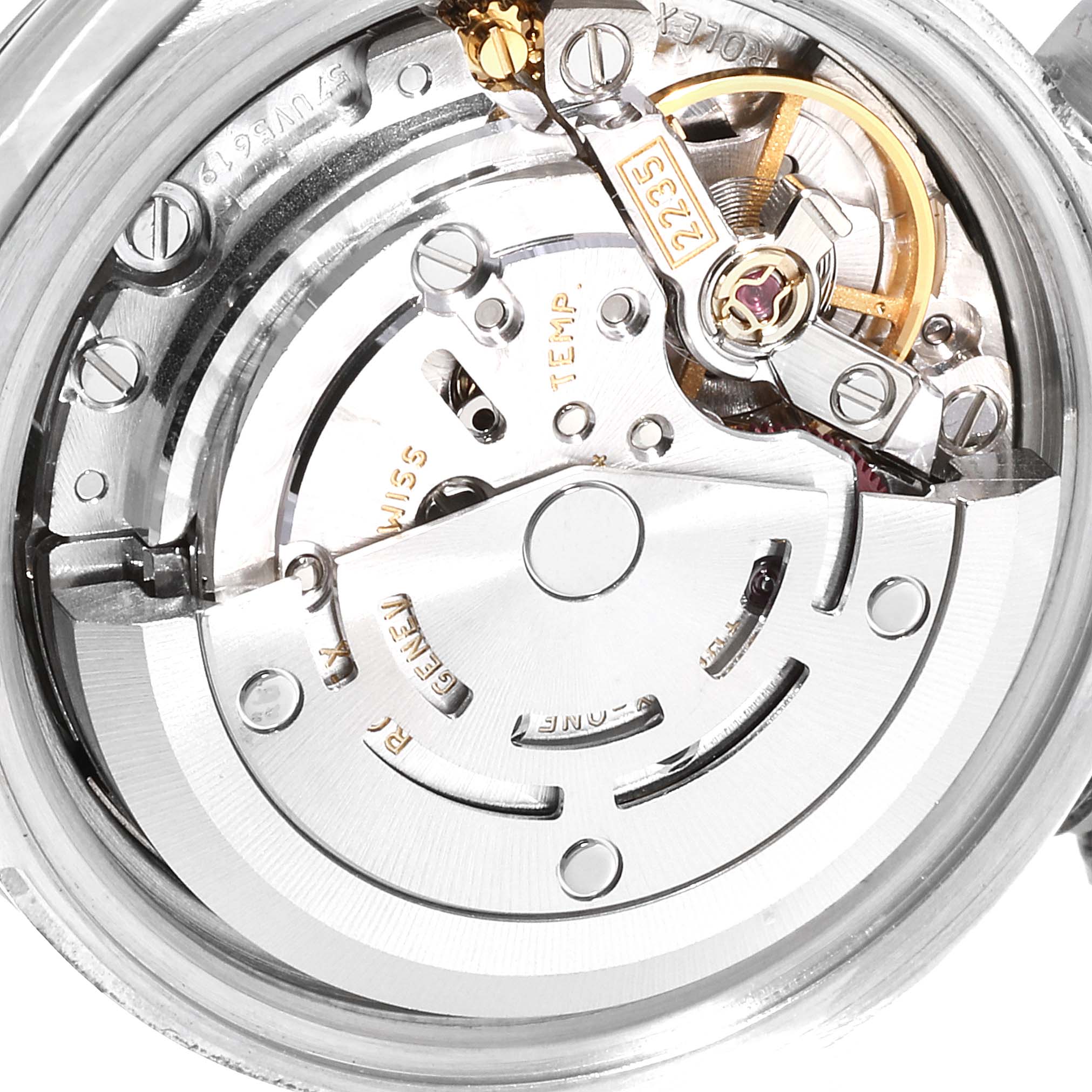 This image shows the intricate automatic movement mechanism of a Rolex Datejust 179174 Women
s Stainless Steel Silver Dial 179174 Women
s Stainless Steel Silver Dial watch from a close-up angle.