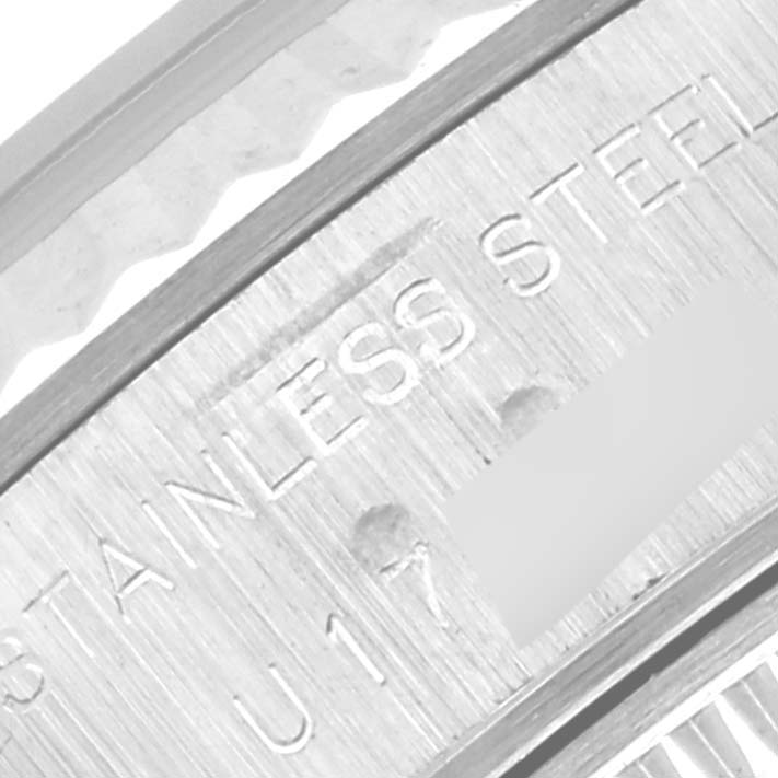 The image shows a close-up of the stainless steel inscription on the casing of a Rolex Datejust 69174 Women's Stainless Steel White Dial 69174 Women's Stainless Steel White Dial watch.