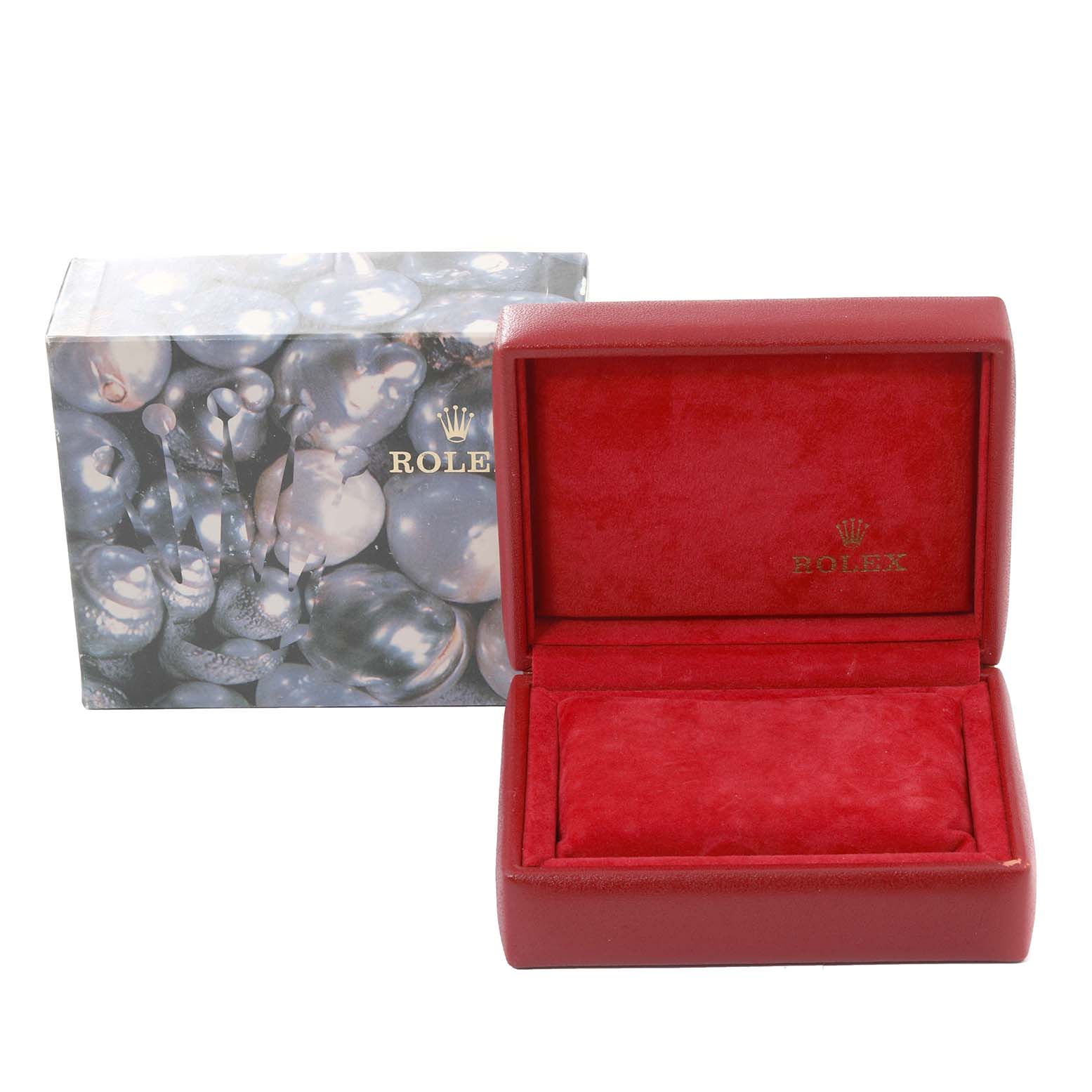 The image shows a red Rolex Datejust 69174 Women
s Stainless Steel Silver Dial 69174 Women
s Stainless Steel Silver Dial watch case with an open lid next to its outer box with a pearl-like design.