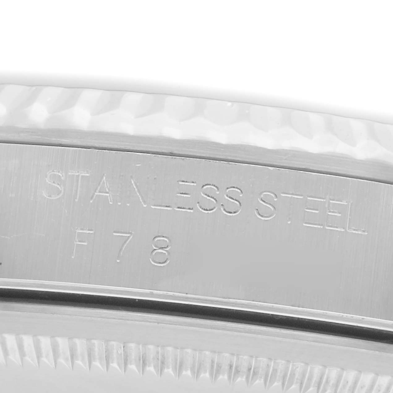 The image shows a close-up of the side of the stainless steel casing for a Rolex Datejust 16234 Men
s Steel and Gold (two tone) Silver Dial 16234 Men
s Steel and Gold (two tone) Silver Dial watch.