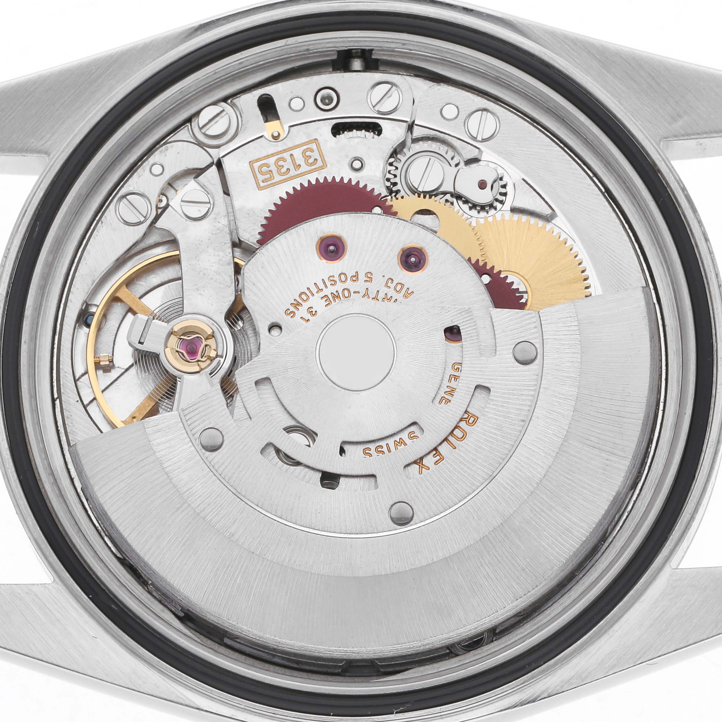 The image shows the back view of a Rolex Datejust 16234 Men
s Steel and Gold (two tone) Silver Dial 16234 Men
s Steel and Gold (two tone) Silver Dial, highlighting its inner mechanical movement and gears.