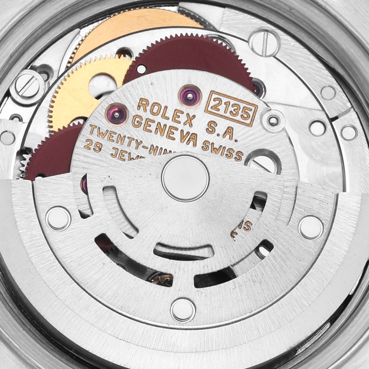 The image shows the inner movement of a Rolex Datejust 69173 Women's Steel and Gold (two tone) Champagne Dial 69173 Women's Steel and Gold (two tone) Champagne Dial watch, highlighting its gears and mechanics.