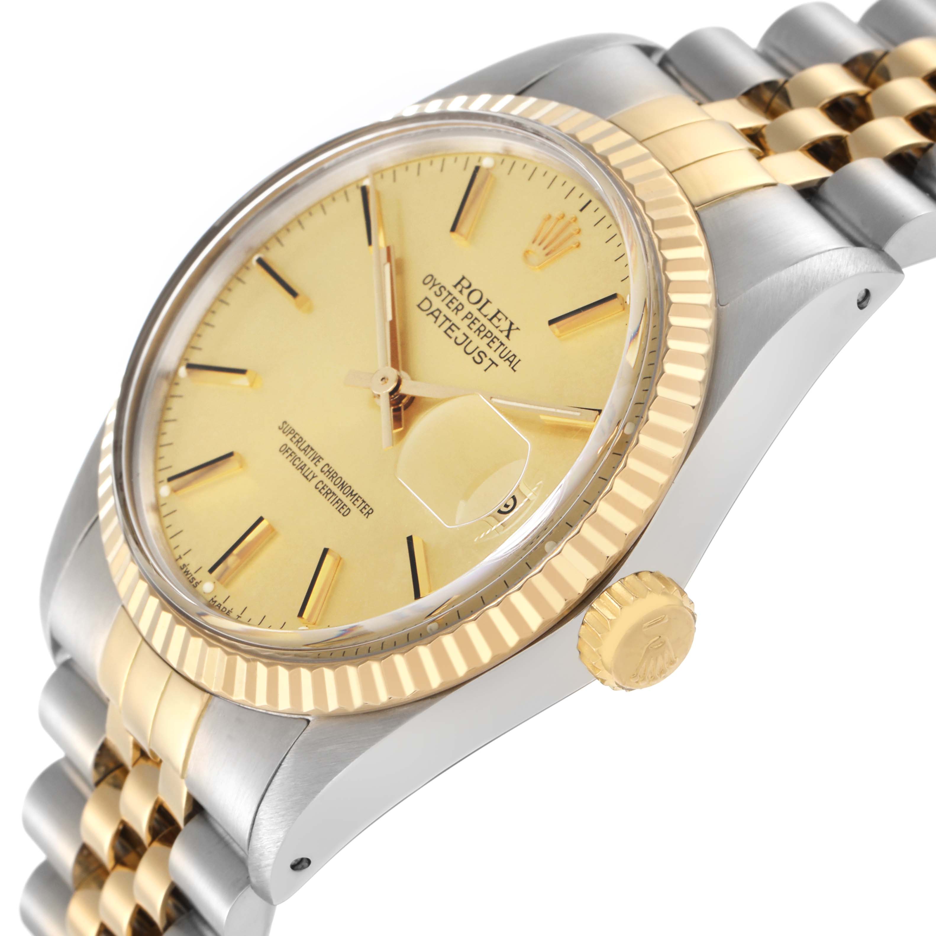 The Rolex Datejust 16013 Men
s Steel and Gold (two tone) Champagne Dial 16013 Men
s Steel and Gold (two tone) Champagne Dial watch is shown from a side angle, displaying the dial, fluted bezel, crown, and Jubilee bracelet.