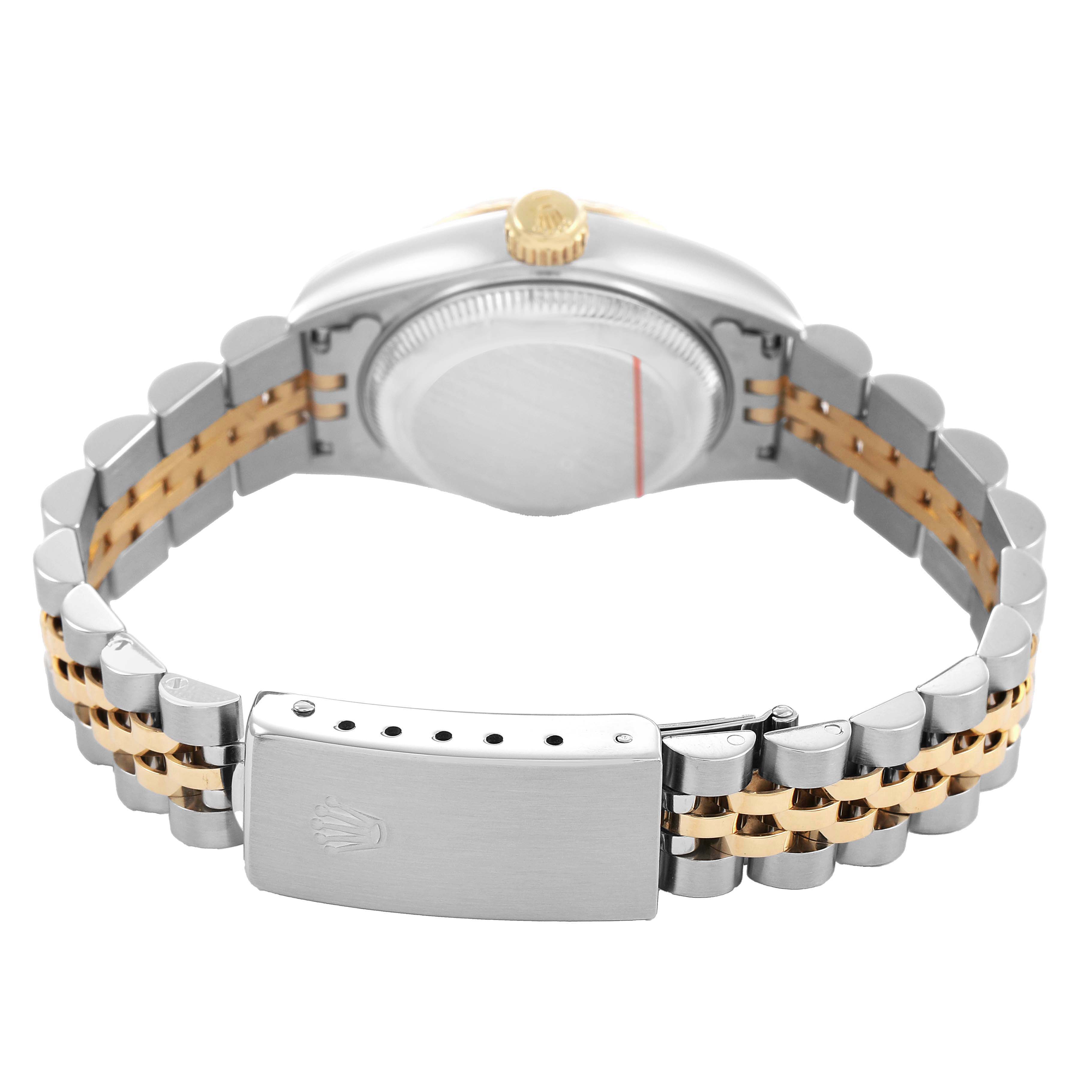 The Rolex Datejust 69173 Women's Steel and Gold (two tone) White Dial watch is shown from the back, highlighting the clasp and two-tone bracelet.