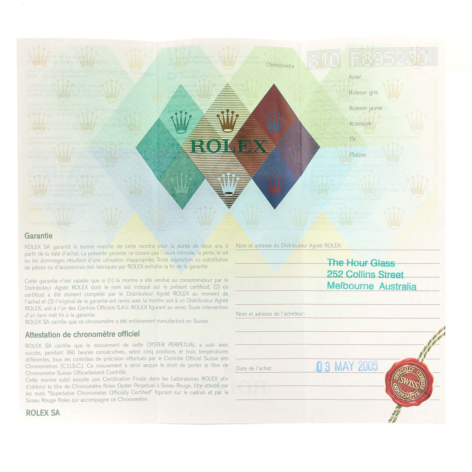 This image shows a warranty card for a Rolex Explorer 114270 Men
s Stainless Steel Black Dial 114270 Men
s Stainless Steel Black Dial watch from The Hour Glass in Melbourne, Australia, dated 03 May 2005.