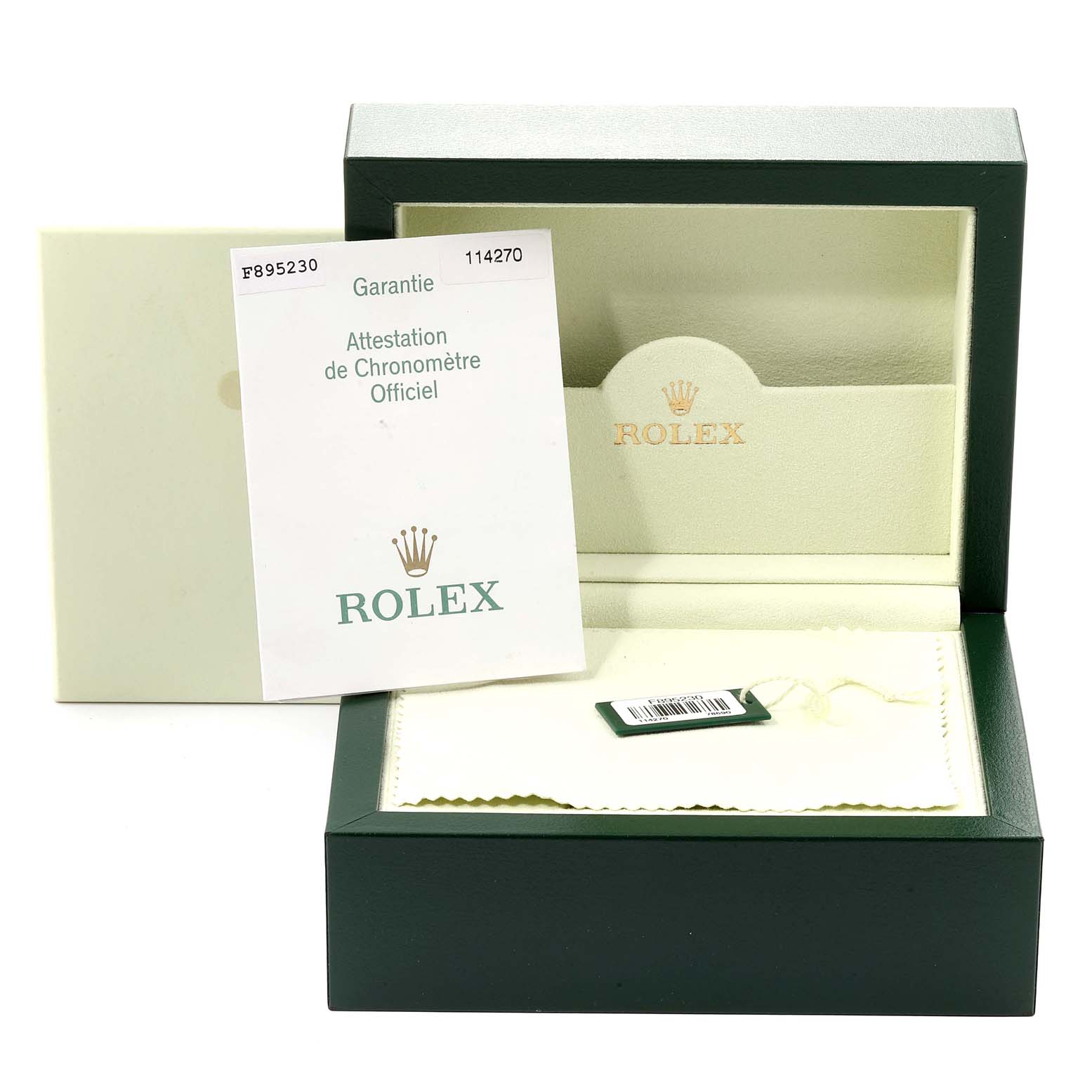 The image shows the packaging and warranty card for a Rolex Explorer 114270 Men
s Stainless Steel Black Dial 114270 Men
s Stainless Steel Black Dial watch, including a green watch box and official documentation.