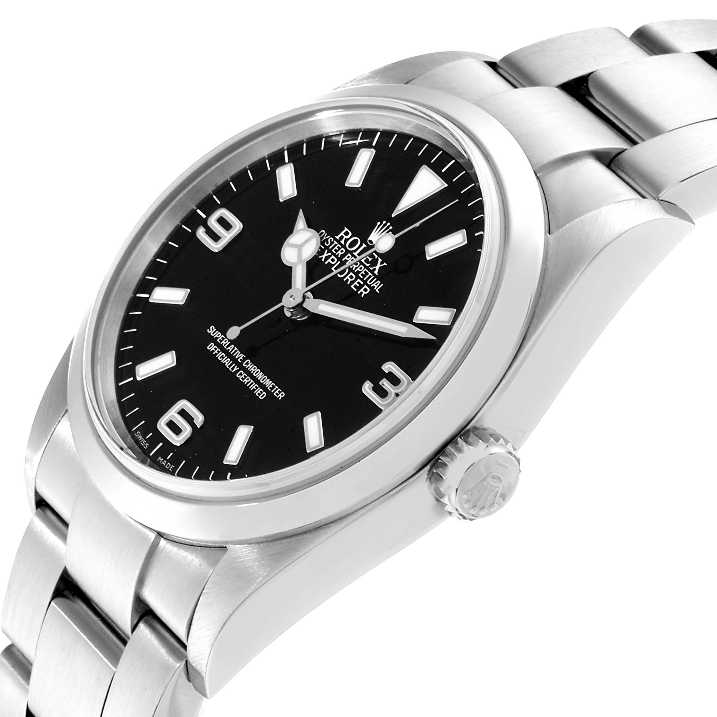 The Rolex Explorer 114270 Men
s Stainless Steel Black Dial 114270 Men
s Stainless Steel Black Dial watch is shown at a slight angle, highlighting the dial, case, crown, and part of the bracelet.