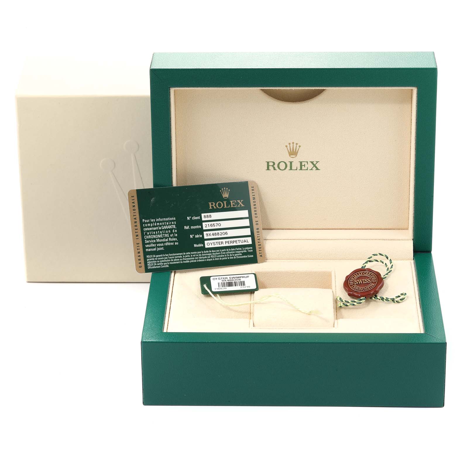 The image shows an open box for a Rolex Explorer 216570 Men's Stainless Steel White Dial 216570 Men's Stainless Steel White Dial, featuring certification cards and a tag.