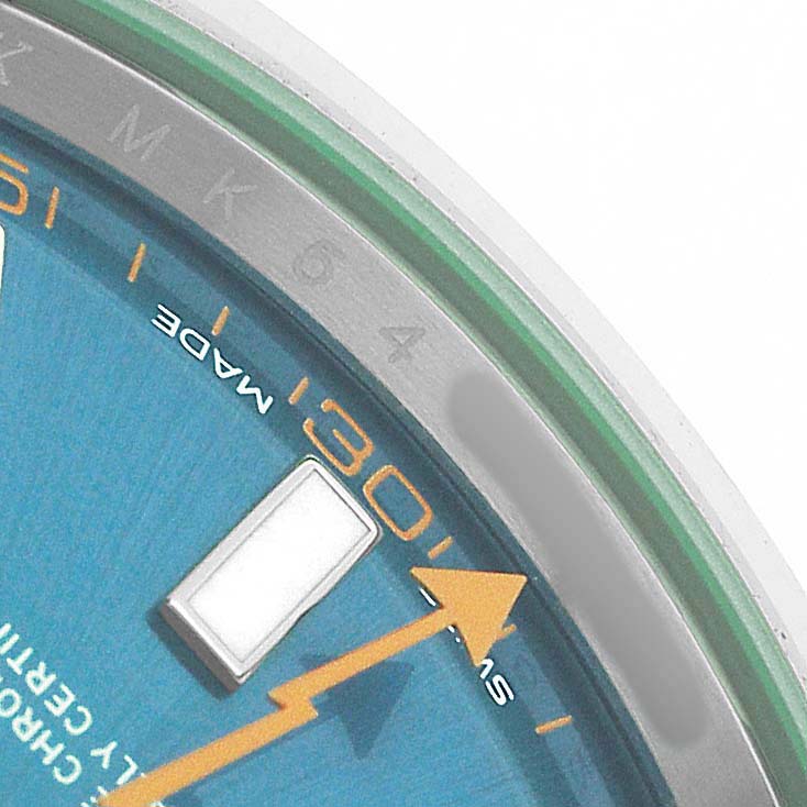 The image shows the watch face of a Rolex Milgauss 116400GV Men's Stainless Steel Blue Dial, highlighting the minute markers, lightning bolt second hand, and part of the bezel.