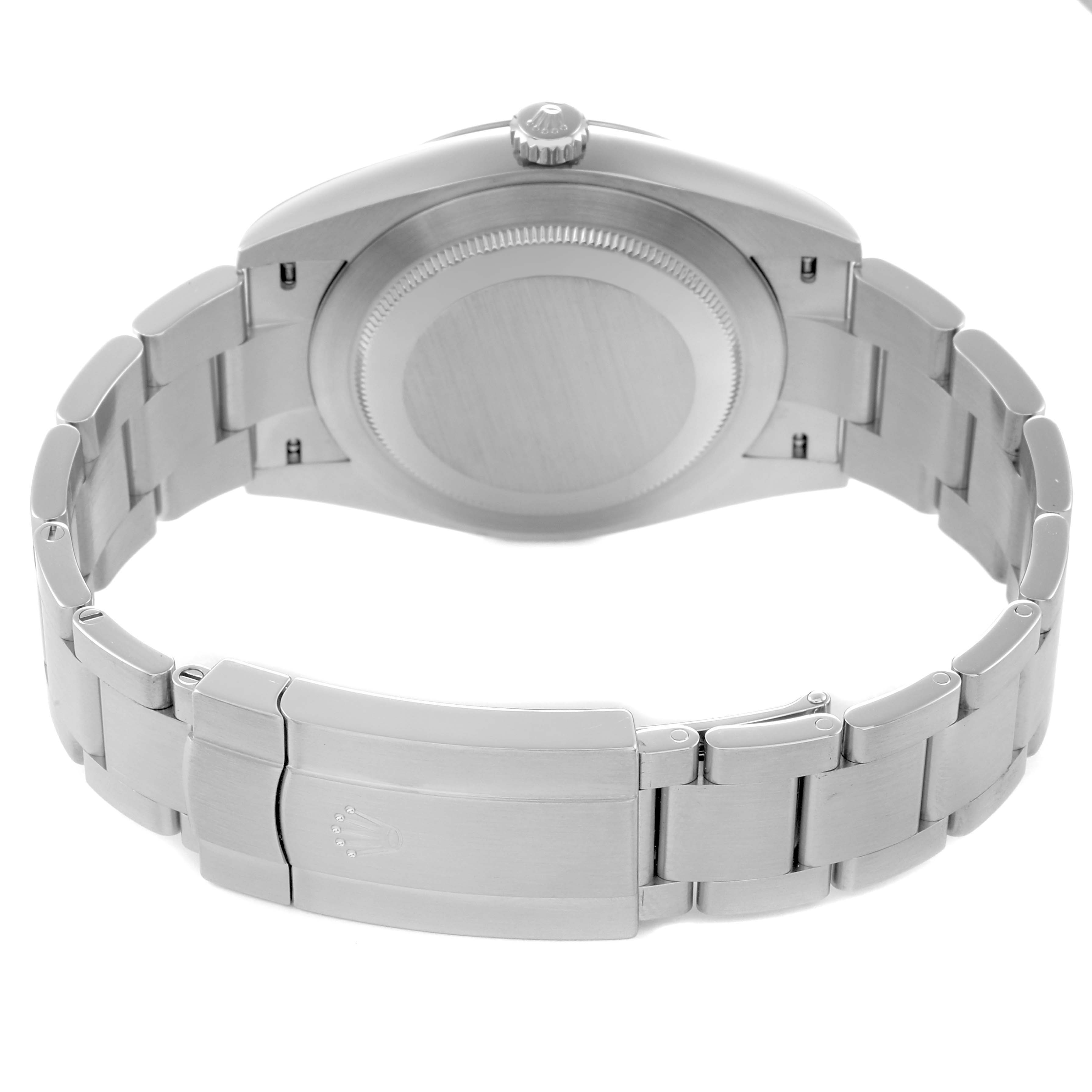 The image shows the back and bracelet of the Rolex Oyster Perpetual 124300 Men
s Stainless Steel Blue Dial 124300 Men
s Stainless Steel Blue Dial, focusing on the clasp and case back.