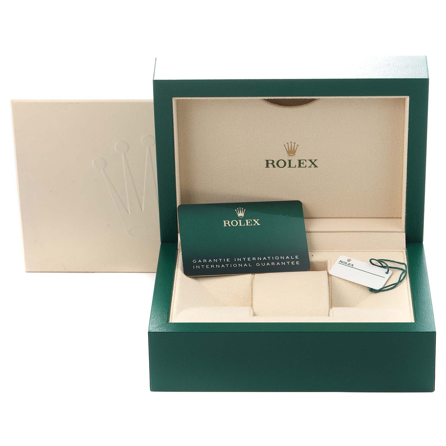 The image shows the open box of a Rolex Oyster Perpetual 124300 Men
s Stainless Steel Blue Dial 124300 Men
s Stainless Steel Blue Dial, revealing the guarantee card and tag inside.