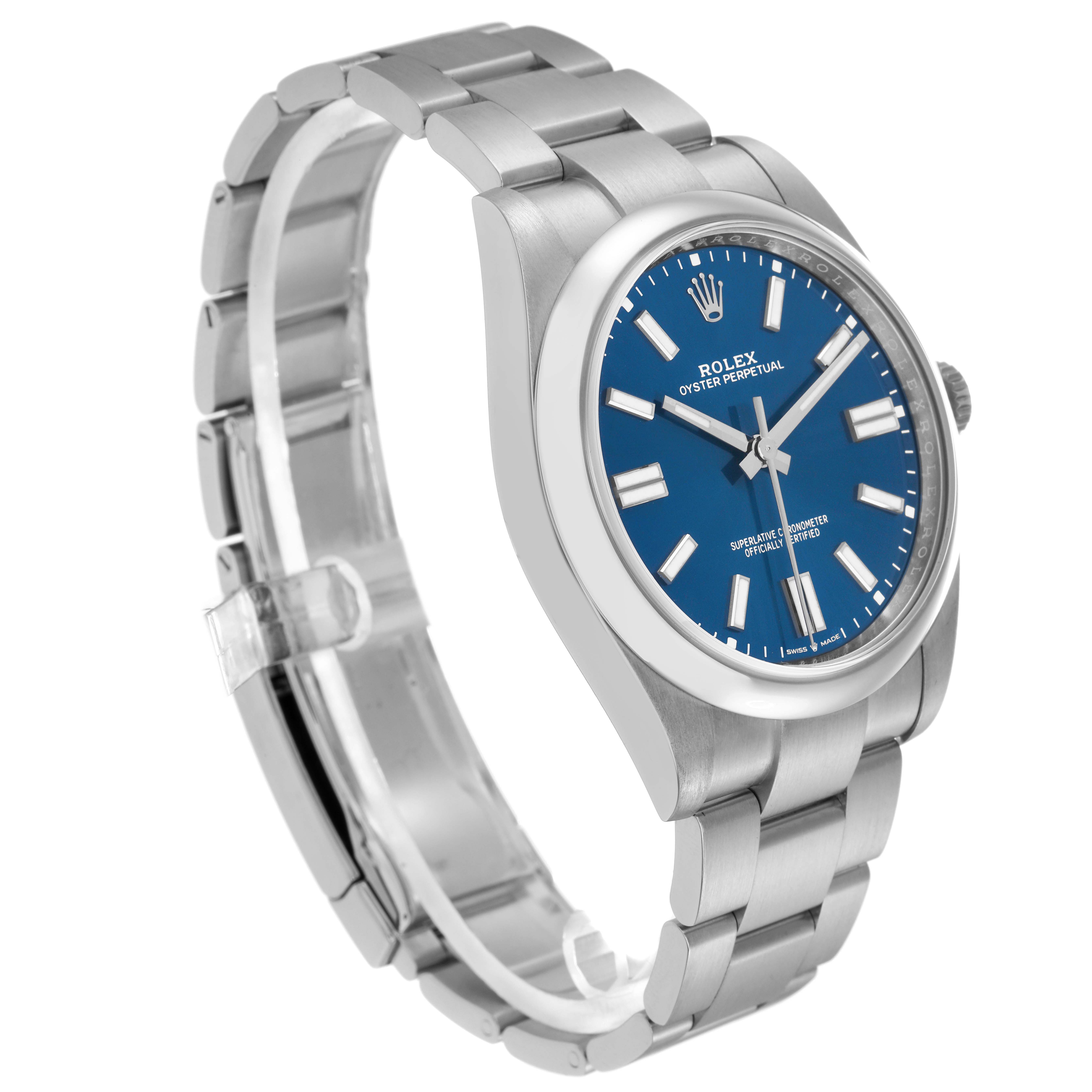 The Rolex Oyster Perpetual 124300 Men
s Stainless Steel Blue Dial 124300 Men
s Stainless Steel Blue Dial is shown at a three-quarter angle, highlighting the bracelet, case, and blue dial.