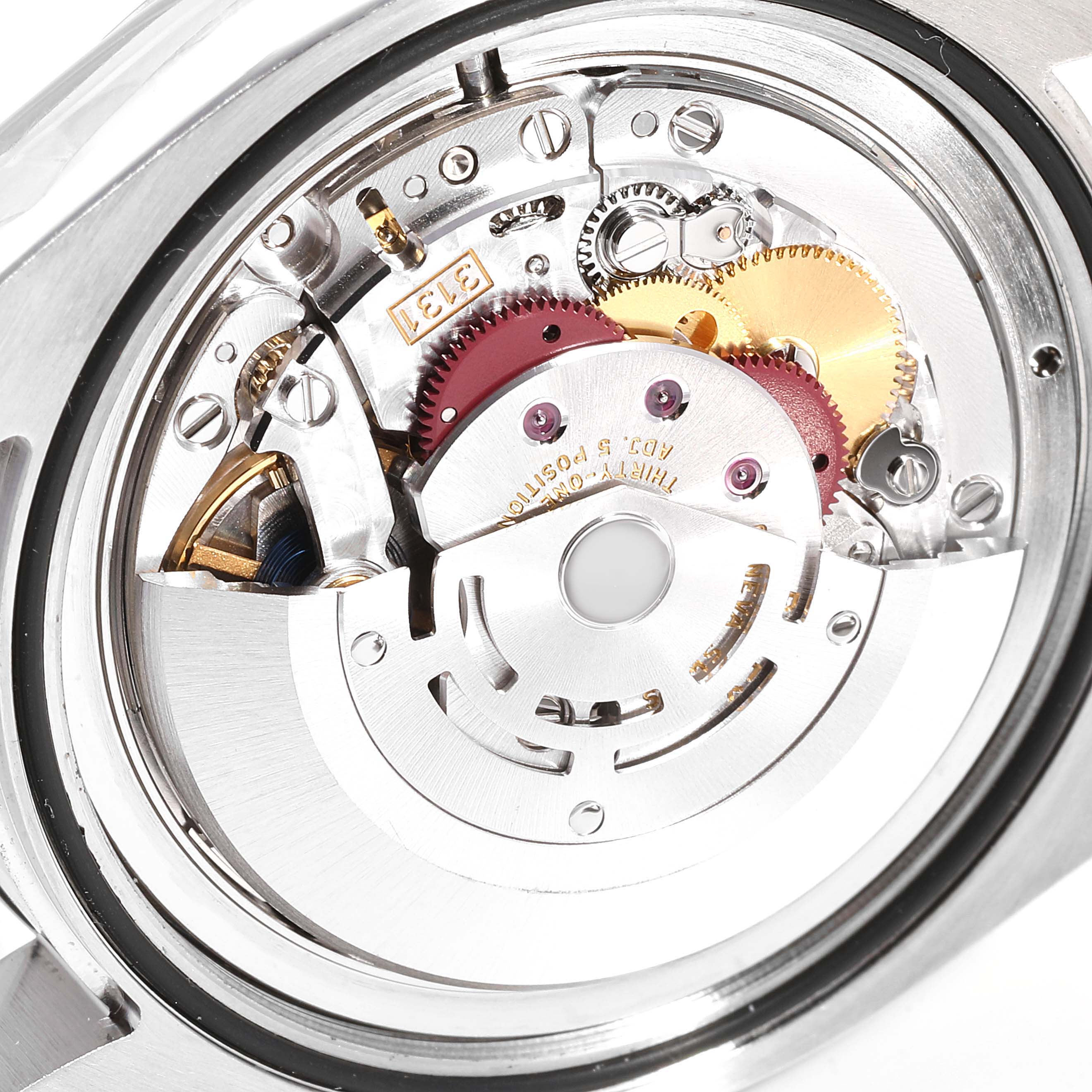 This image shows a close-up view of the internal movement mechanism of a Rolex Air-King 116900 Men's Stainless Steel Black Dial 116900 Men's Stainless Steel Black Dial watch.