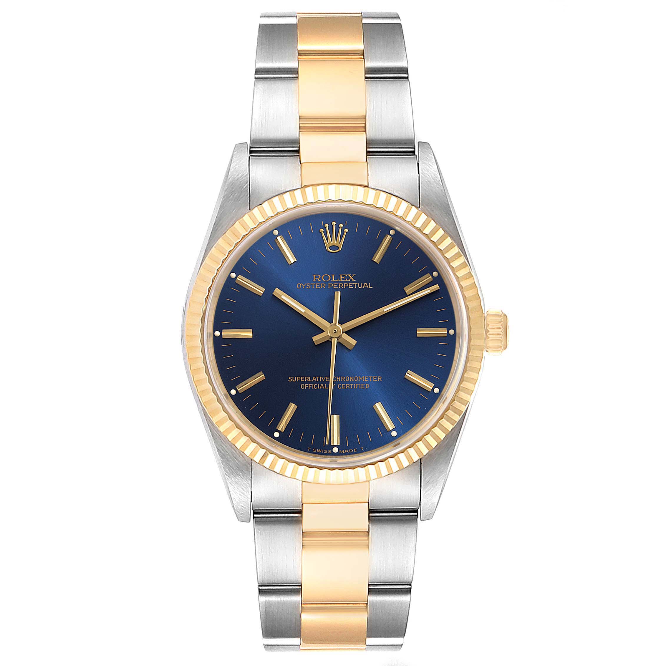 This image shows a front view of a Rolex Oyster Perpetual 14233 Men's Steel and Gold (two tone) Blue Dial 14233 Men's Steel and Gold (two tone) Blue Dial watch featuring a blue dial and a two-tone metal band.