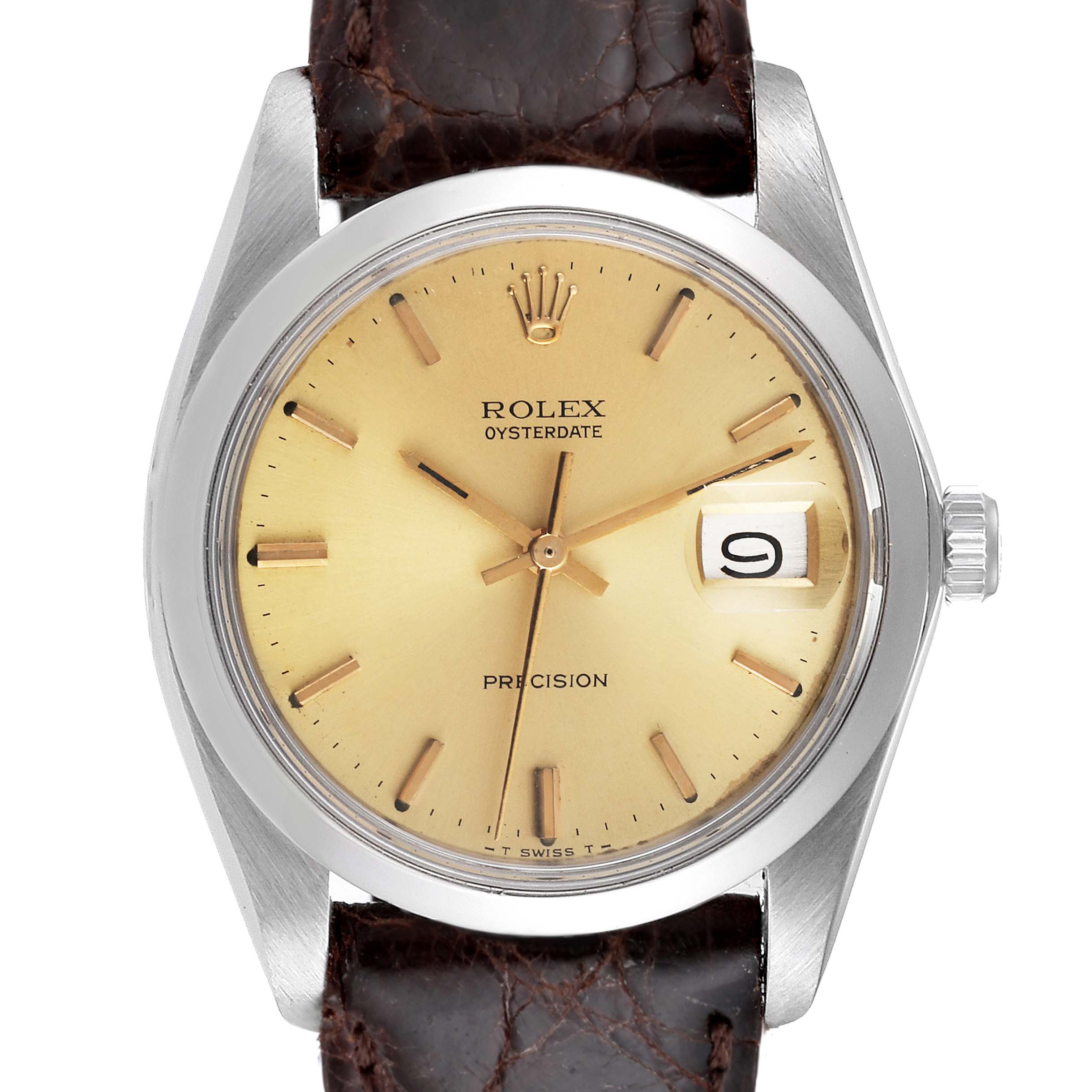 The image shows a front view of a Rolex Vintage Collection 6694 Men's Stainless Steel Champagne Dial 6694 Men's Stainless Steel Champagne Dial watch, featuring its beige dial, date window, silver casing, and brown leather strap.