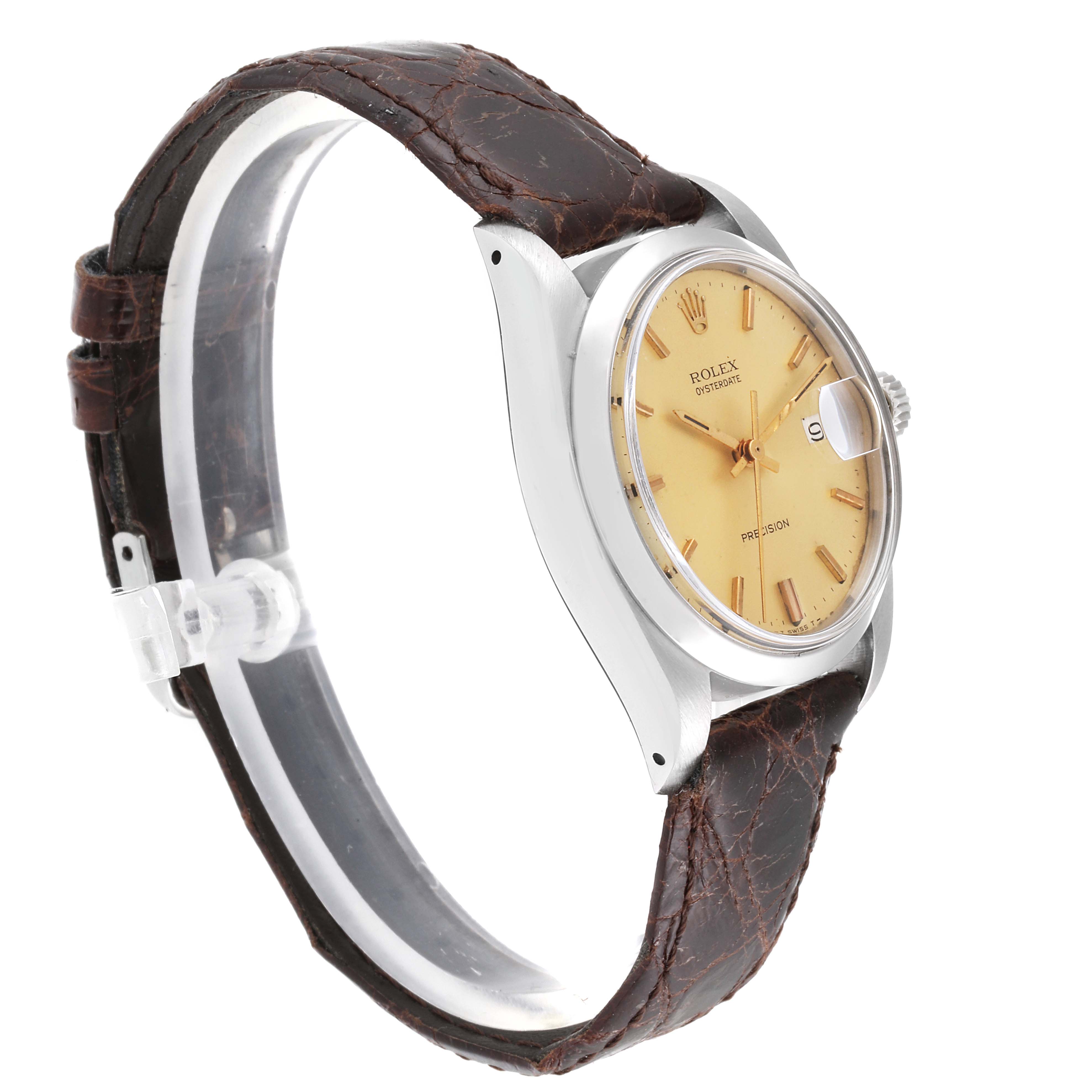 The watch is a Vintage Collection model by Rolex shown at a side angle, featuring a crocodile leather strap and a beige dial.