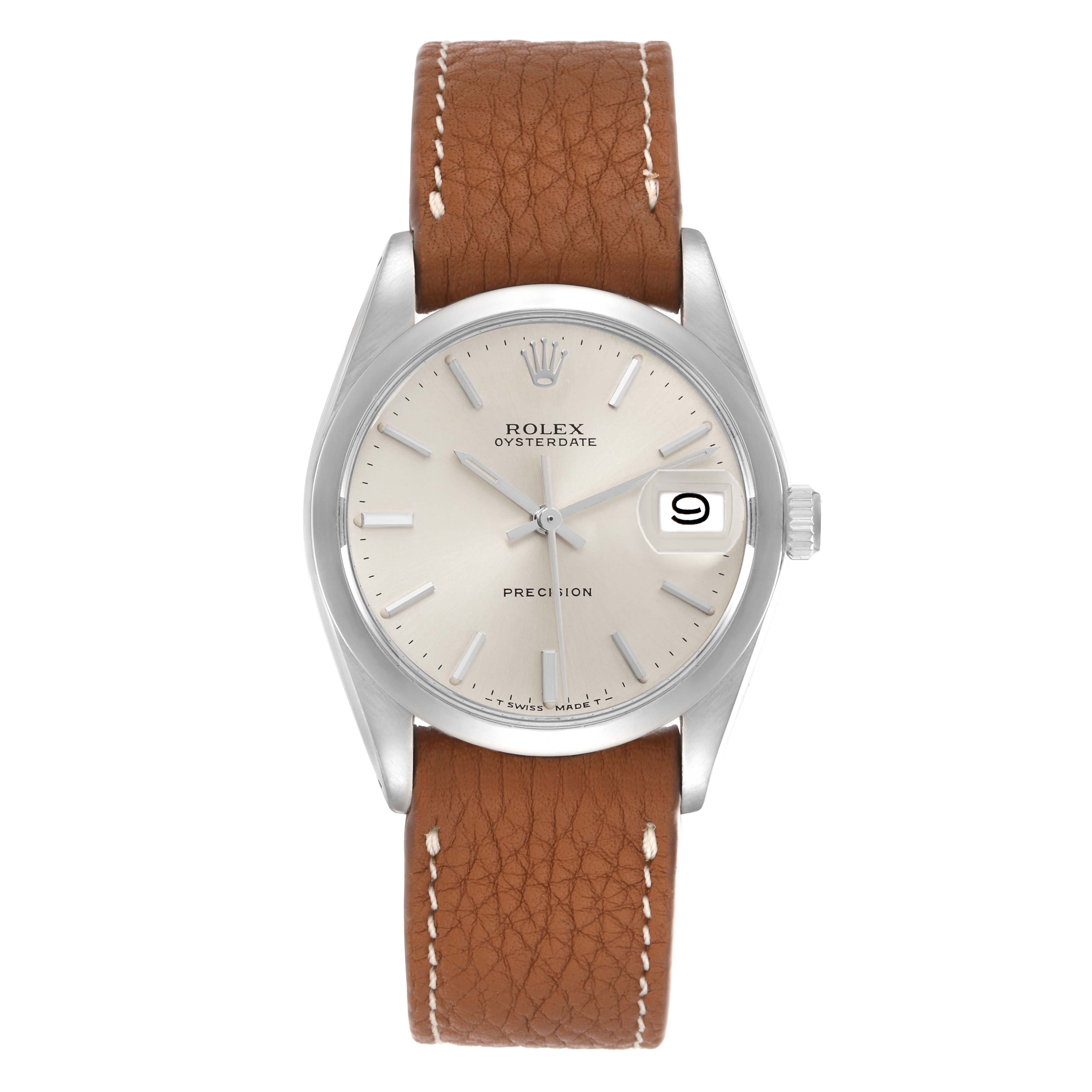 The Rolex Date 6694 Men
s Stainless Steel Silver Dial 6694 Men
s Stainless Steel Silver Dial watch is shown from a front angle, displaying the dial, case, crown, and brown leather strap.