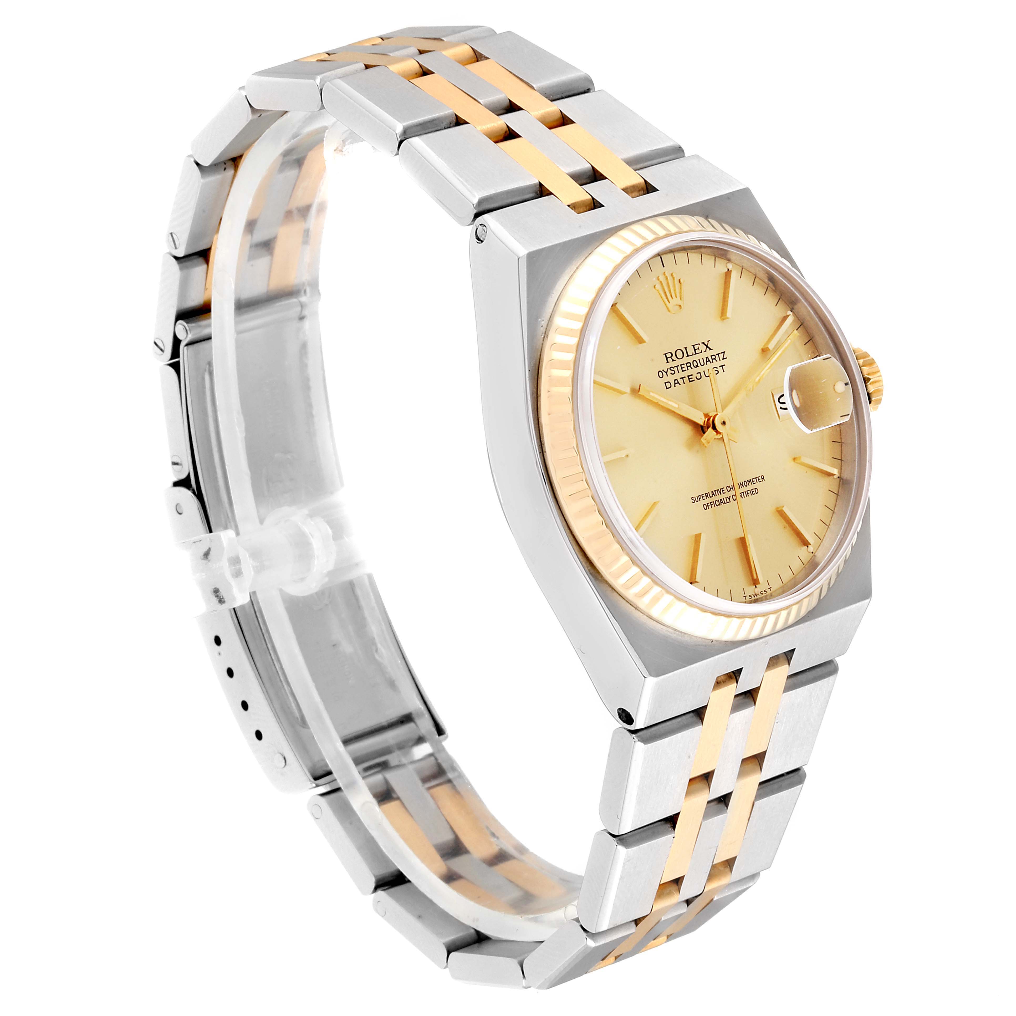 The image shows a side angle of the Rolex Oysterquartz 17013 Men
s Steel and Gold (two tone) Champagne Dial 17013 Men
s Steel and Gold (two tone) Champagne Dial watch, highlighting its gold and silver band, dial, and date window.