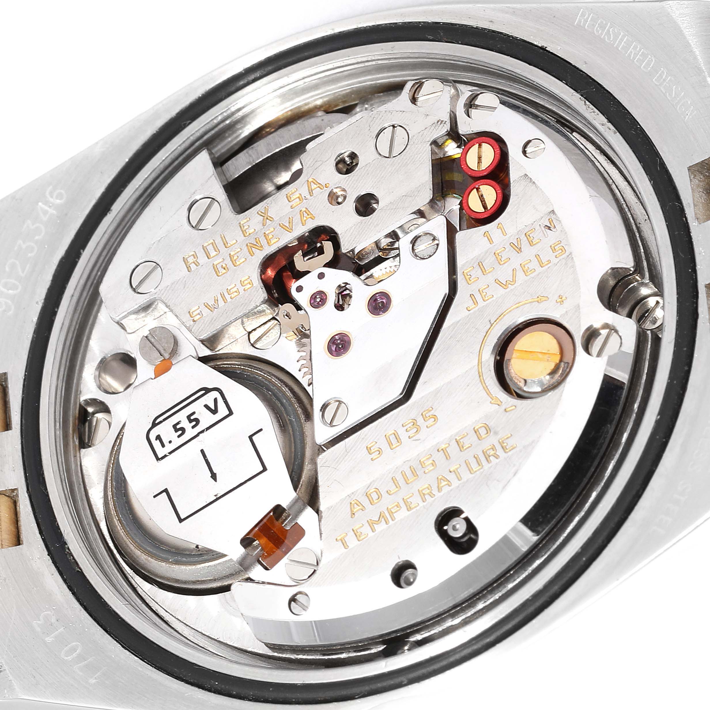 The image shows the internal movement mechanism of a Rolex Oysterquartz 17013 Men
s Steel and Gold (two tone) Champagne Dial 17013 Men
s Steel and Gold (two tone) Champagne Dial watch from a close-up angle.